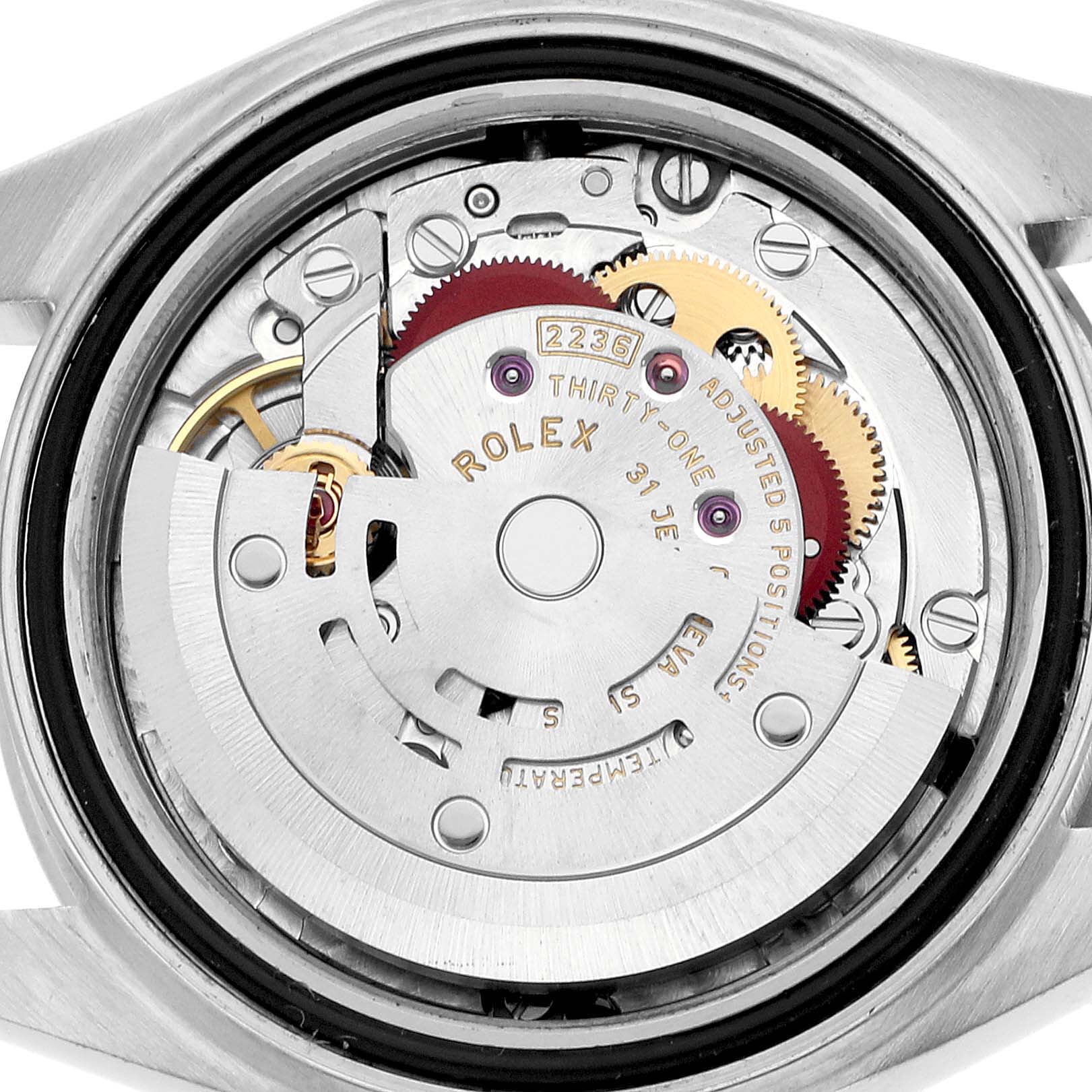 The image shows the movement of the Rolex Datejust 279160 Women's Stainless Steel Pink Dial watch from a top-down angle, focusing on the inner mechanical components.