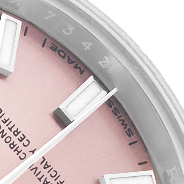 The image shows the upper right corner of a Rolex Datejust 279160 Women's Stainless Steel Pink Dial watch, highlighting the dial and hour markers.