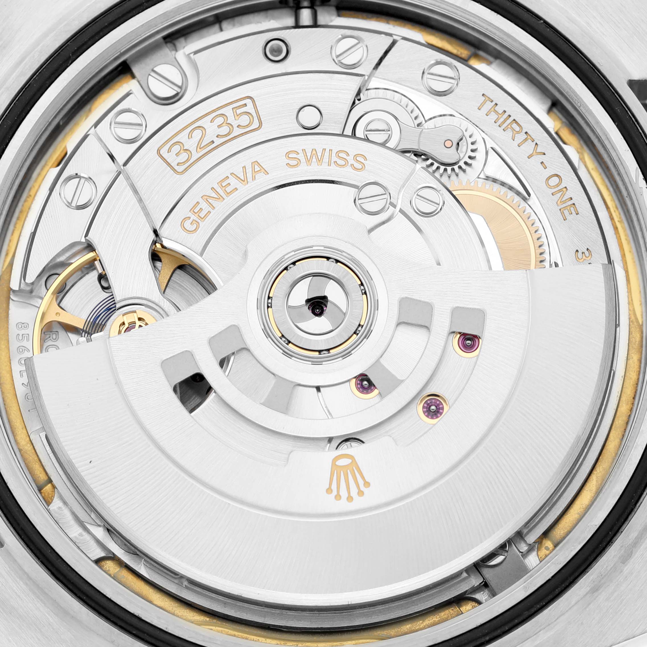 The image shows the internal mechanism of a Rolex Datejust 41 126300 Men's Stainless Steel White Dial 126300 Men's Stainless Steel White Dial, highlighting its Swiss-made 3235 movement.