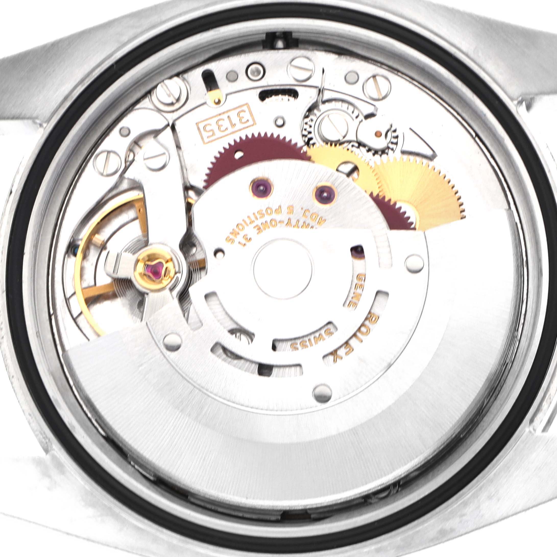 The image shows the movement mechanism of a Rolex Datejust 116200 Men's Stainless Steel Black Dial watch from a back angle.