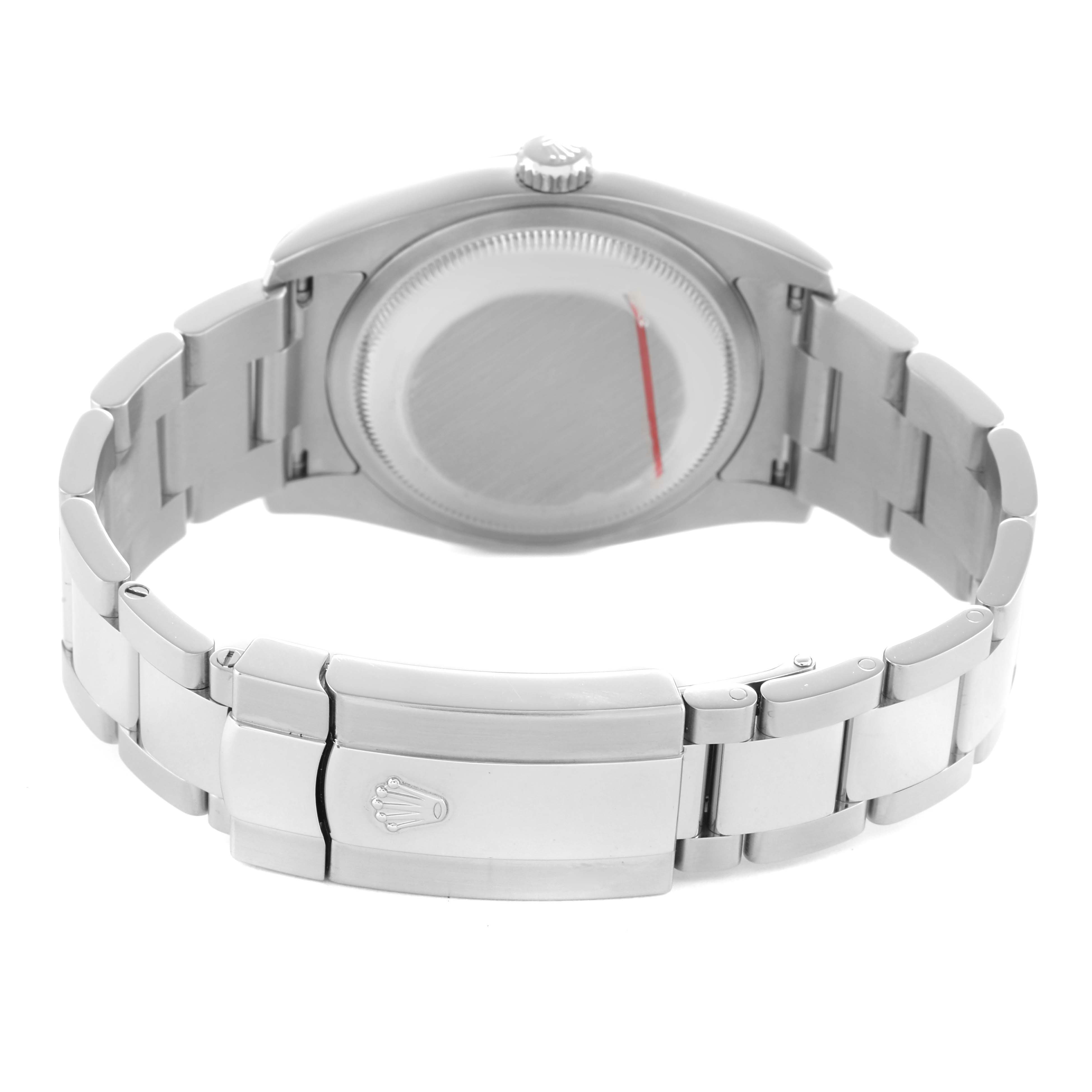 The image shows the back angle of a Rolex Datejust 116200 Men's Stainless Steel Black Dial watch, highlighting the case back and bracelet clasp.