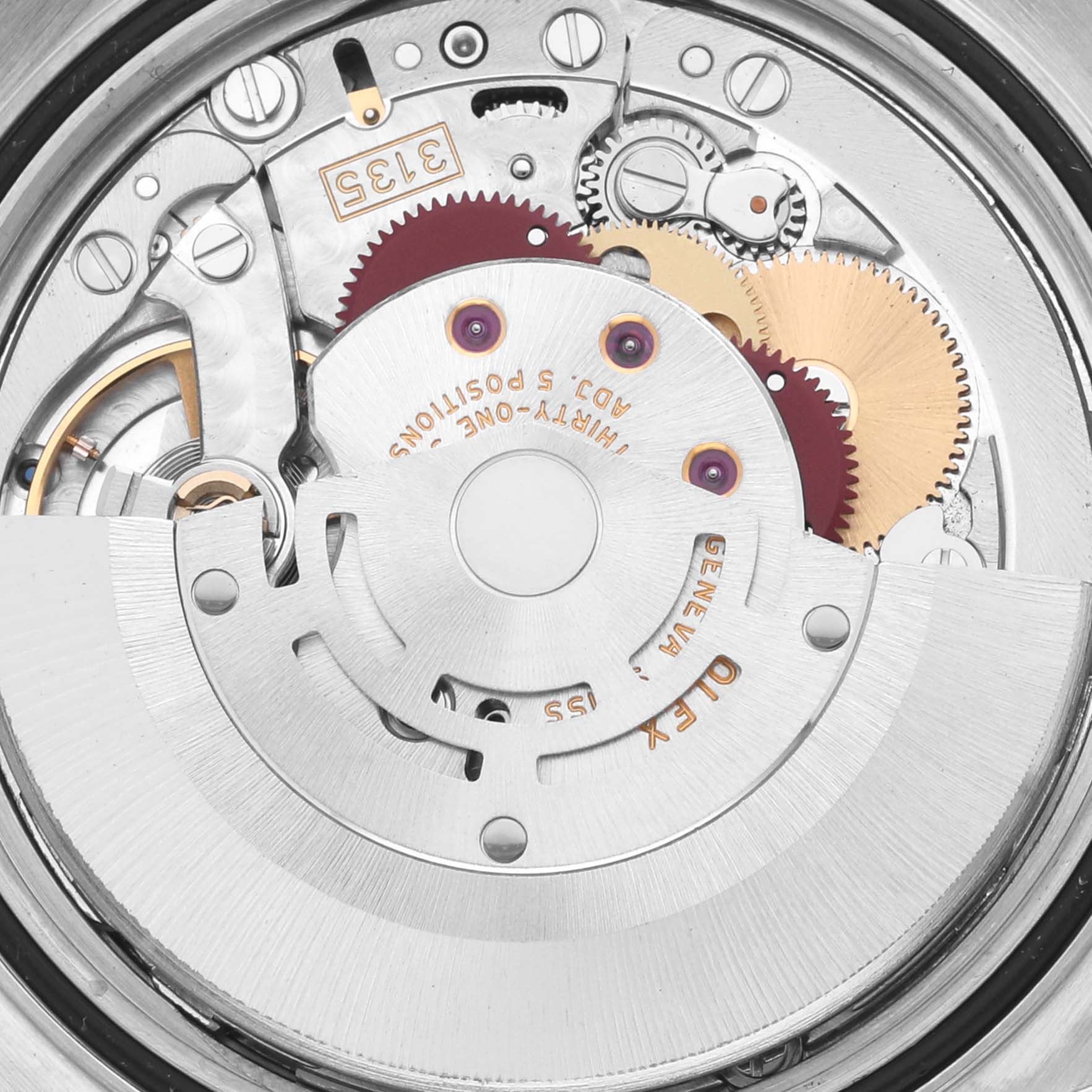 The image shows the movement mechanism of a Rolex Datejust 16220 Men's Stainless Steel Silver Dial 16220 Men's Stainless Steel Silver Dial watch from an internal angle, highlighting gears and components.