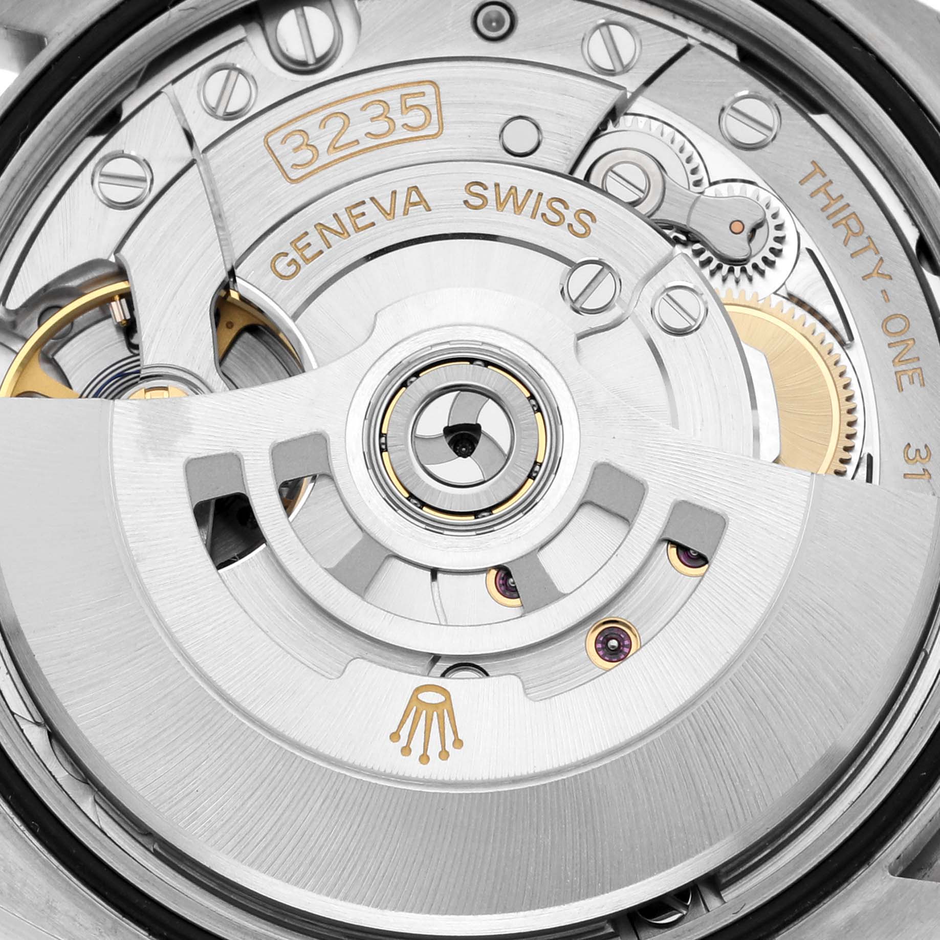 The image shows a close-up of the Rolex Datejust 126284 Men's Stainless Steel Pink Dial 126284 Men's Stainless Steel Pink Dial's movement, highlighting its intricate internal components and rotor.