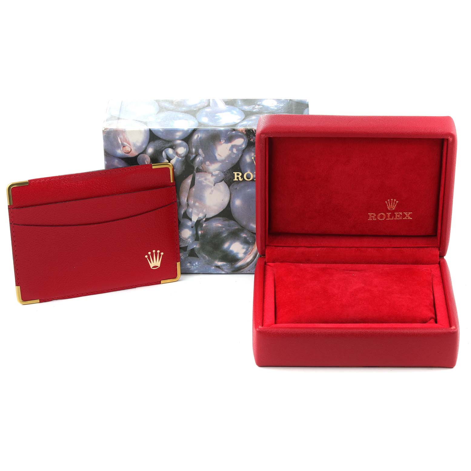 The image shows a red Rolex gift box, a matching cardholder, and a decorative outer box, suited for the Datejust model by Rolex.