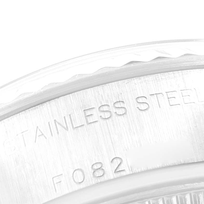 This close-up image shows the stainless steel case back and engraved serial number of a Rolex Datejust 79174 Women
s Stainless Steel Blue Dial 79174 Women
s Stainless Steel Blue Dial model watch.