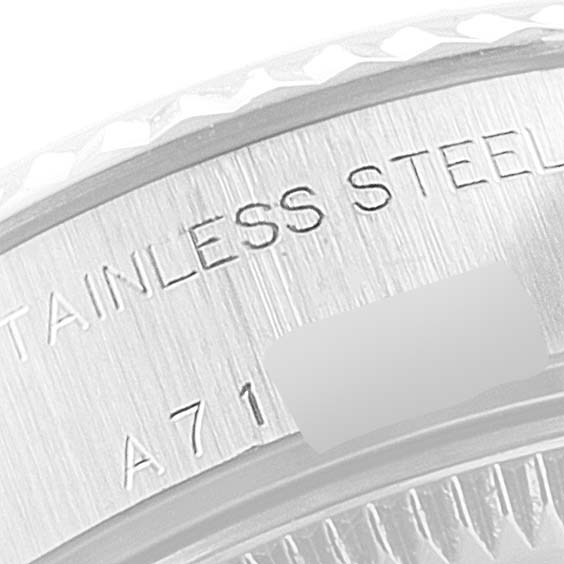 This image shows a close-up angle of the stainless steel case back of a Rolex Datejust 79174 Women
s Stainless Steel Mother of Pearl Dial 79174 Women
s Stainless Steel Mother of Pearl Dial watch.