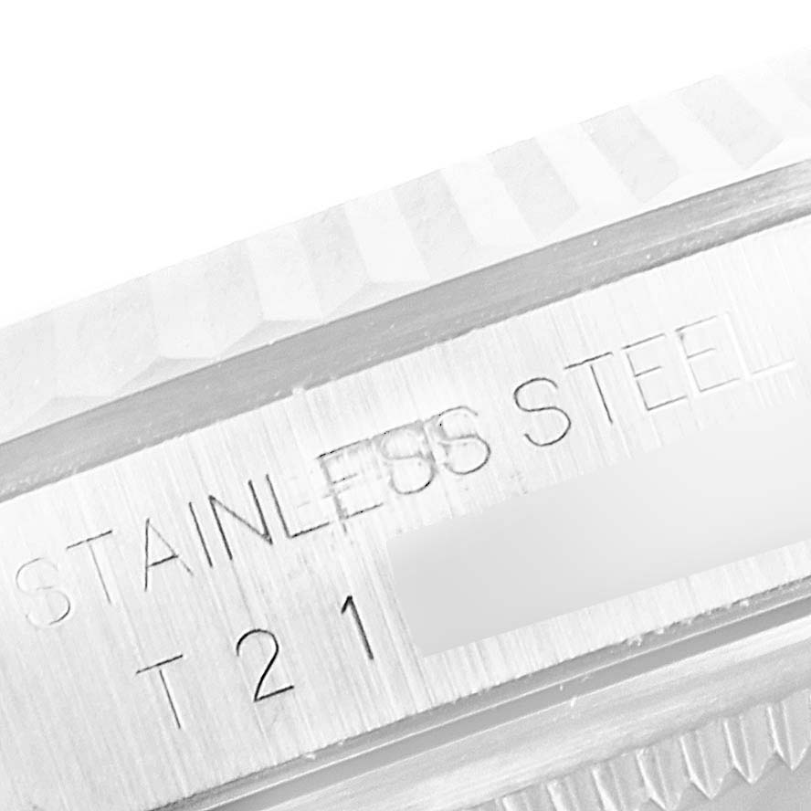 This close-up image shows the bezel and part of the case of a Rolex Datejust 16234 Men
s Stainless Steel Mother of Pearl Dial 16234 Men
s Stainless Steel Mother of Pearl Dial stainless steel watch.