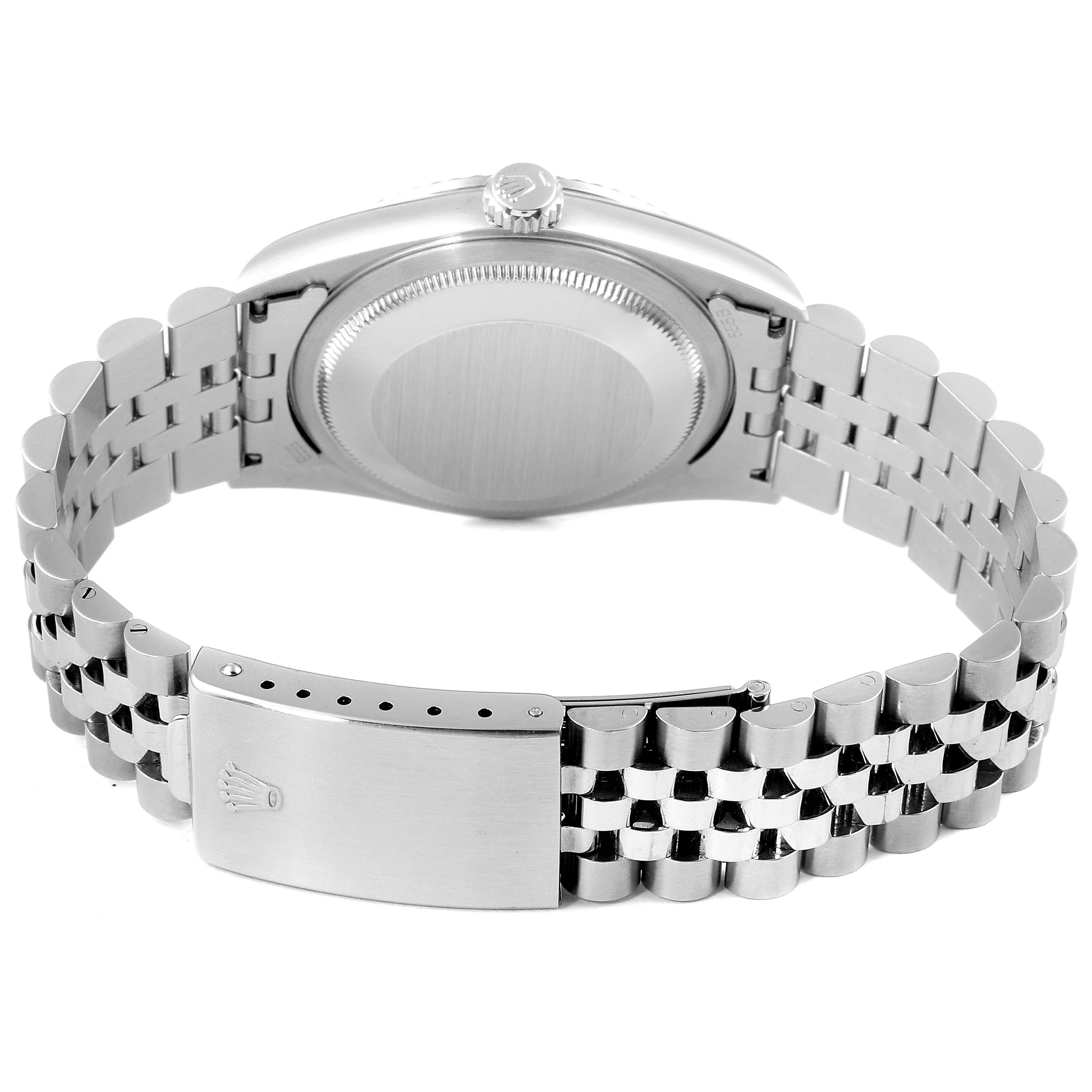 This image shows the back view of a Rolex Datejust 16234 Men
s Stainless Steel Mother of Pearl Dial 16234 Men
s Stainless Steel Mother of Pearl Dial watch, highlighting its case back and bracelet clasp.