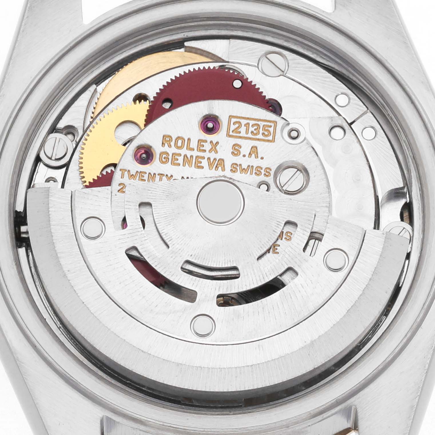 The image shows the movement of a Rolex Datejust 69173 Women's Steel and Gold (two tone) Champagne Dial, featuring intricate gears and components, viewed from the back.