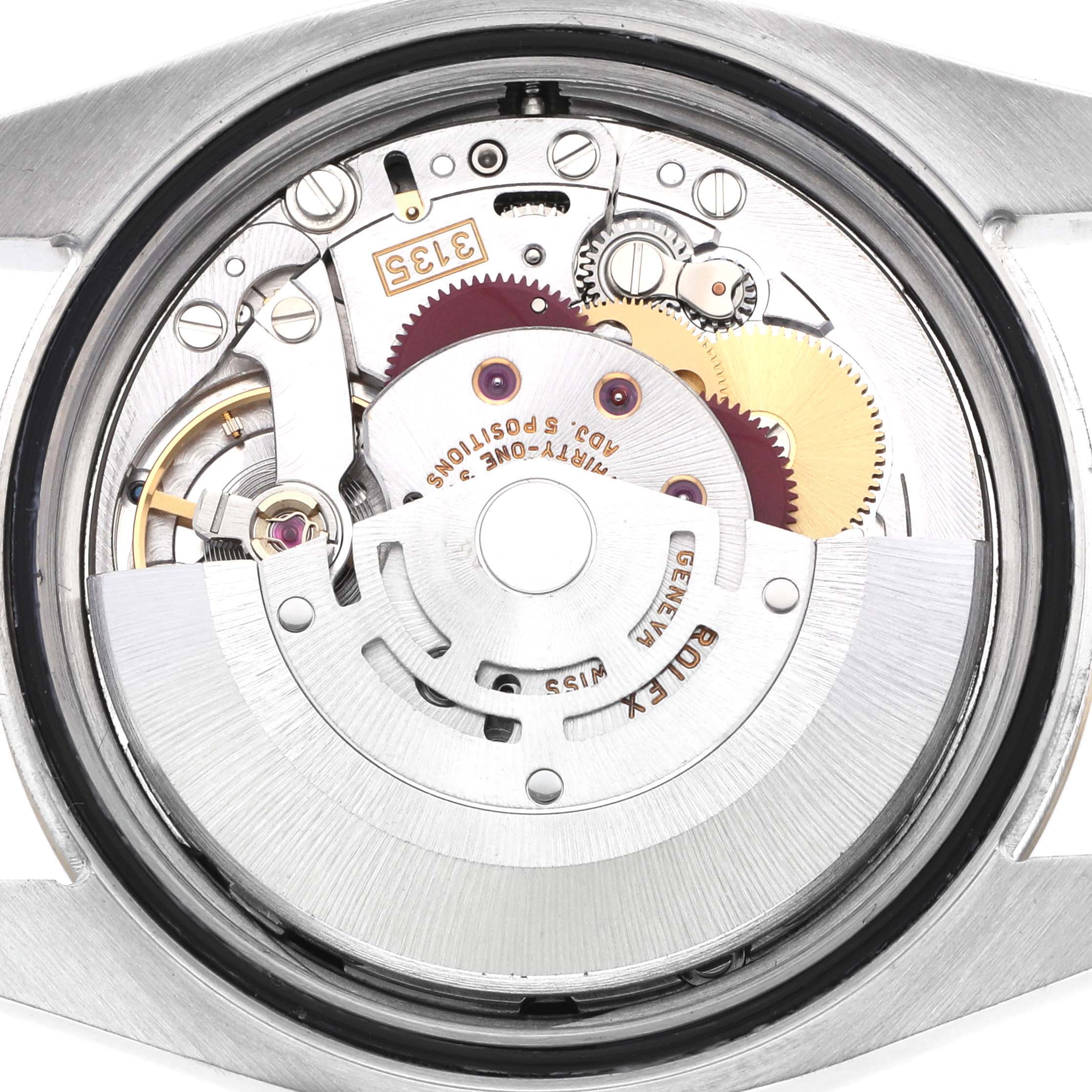The image shows the movement of a Rolex Datejust 116233 Men's Steel and Gold (two tone) Black Dial watch from the back, highlighting gears and the rotor.
