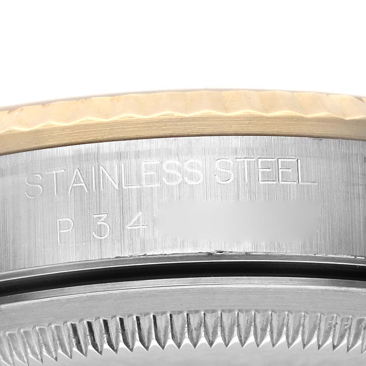 The image shows the side view of a Rolex Datejust 16233 Men's Steel and Gold (two tone) Champagne Dial 16233 Men's Steel and Gold (two tone) Champagne Dial watch, highlighting the stainless steel case and part of the bezel.