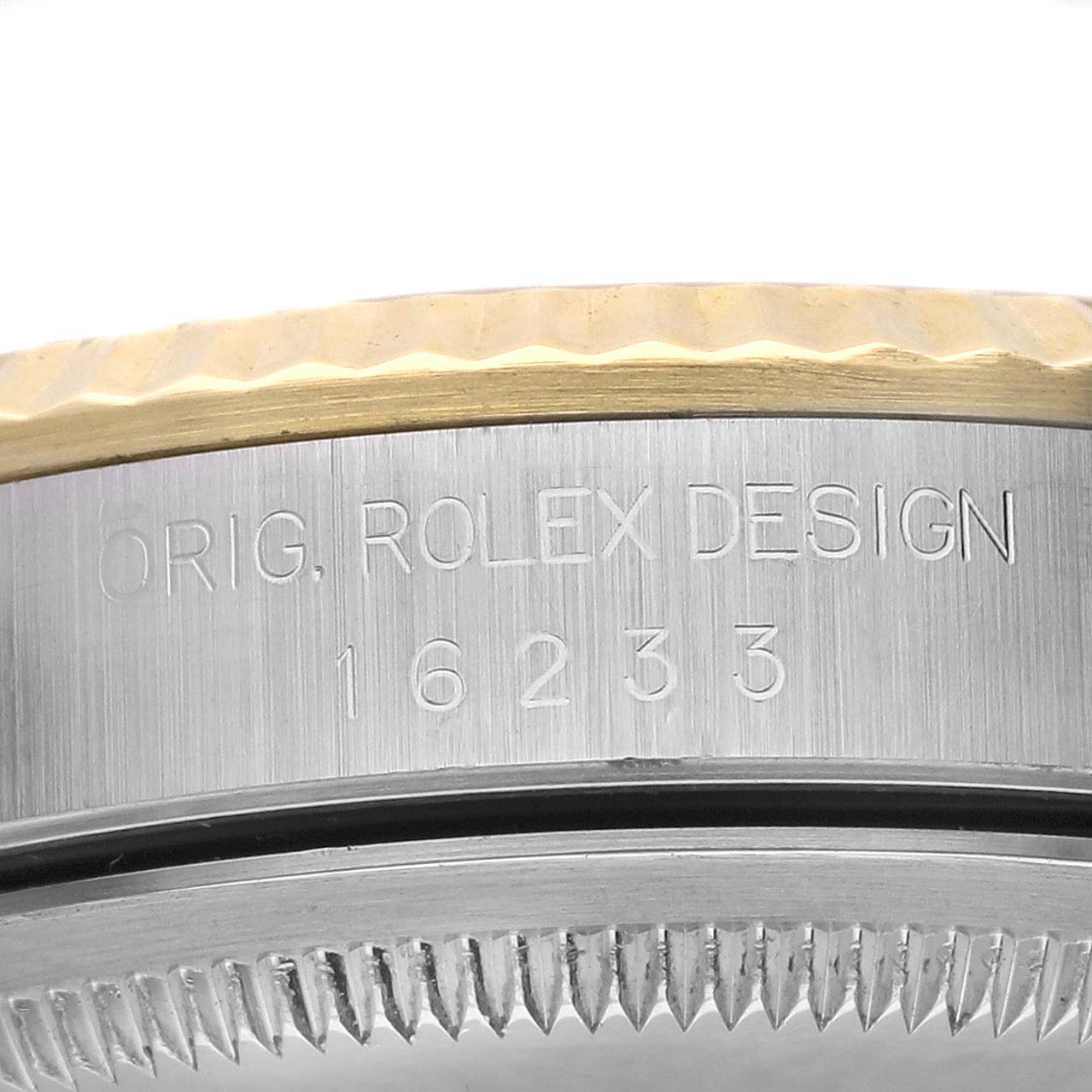 The image shows the side view of a Rolex Datejust 16233 Men's Steel and Gold (two tone) Champagne Dial 16233 Men's Steel and Gold (two tone) Champagne Dial watch, highlighting the engraved case with the model number.