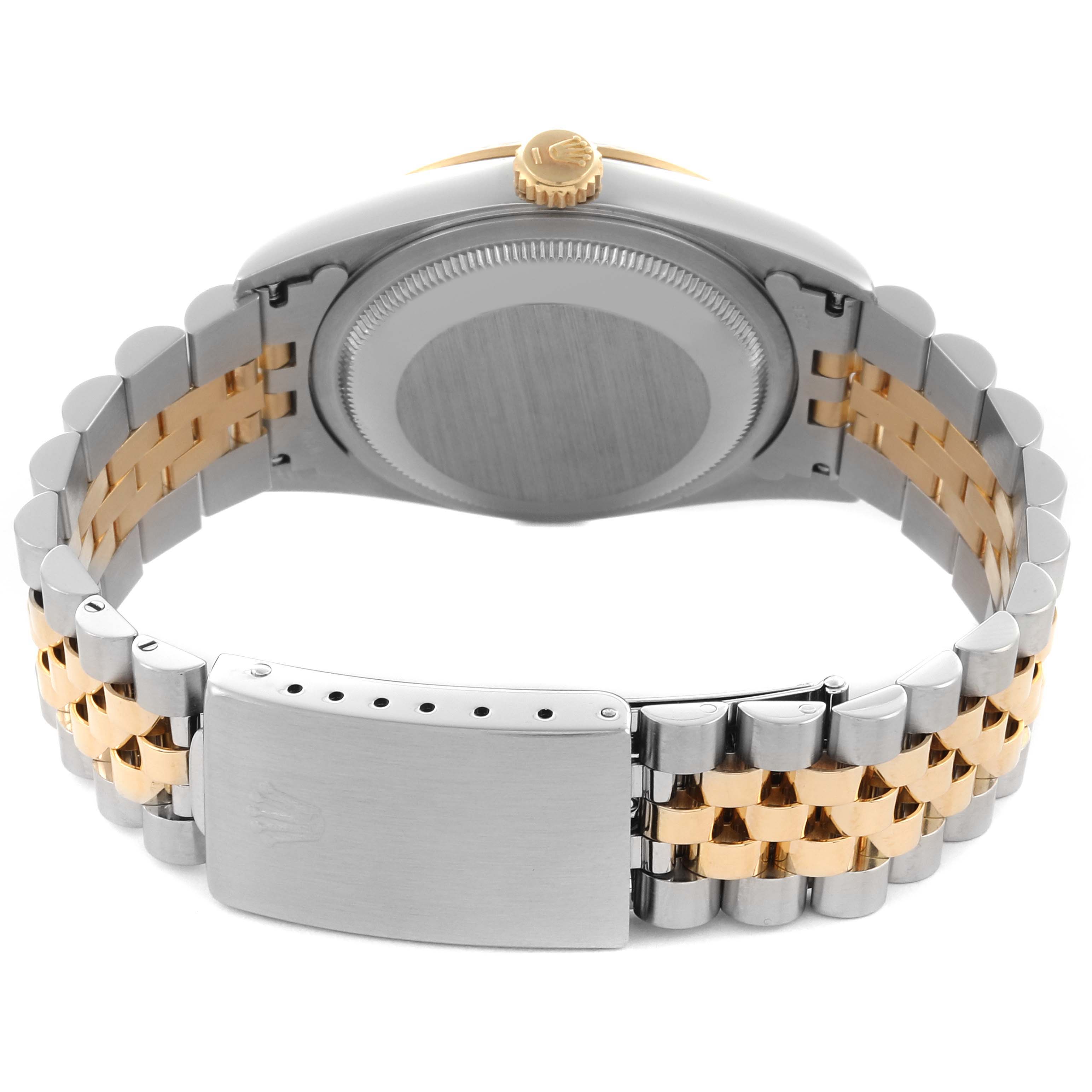 The image shows the back and clasp of a Rolex Datejust 16233 Men's Steel and Gold (two tone) White Dial 16233 Men's Steel and Gold (two tone) White Dial watch with a two-tone bracelet.