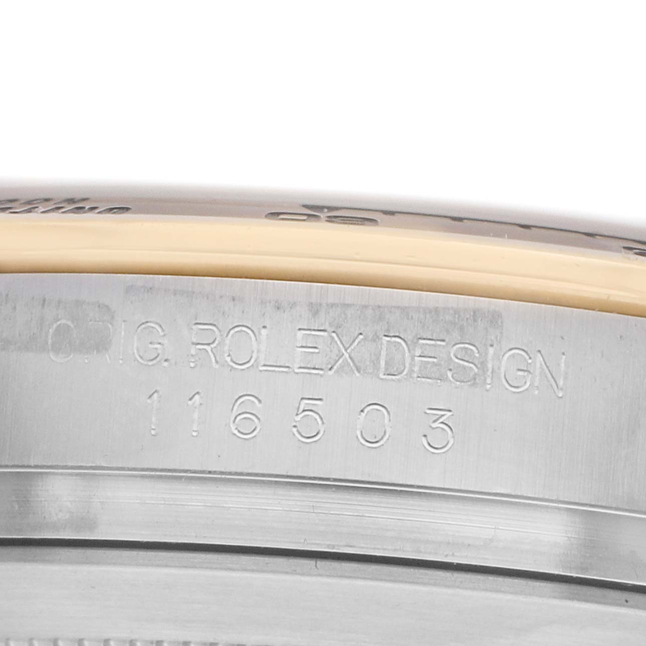 The image shows a close-up of the side engraving on the case of a Rolex Daytona 116503 Men's Steel and Gold (two tone) Black Dial, displaying the model number.