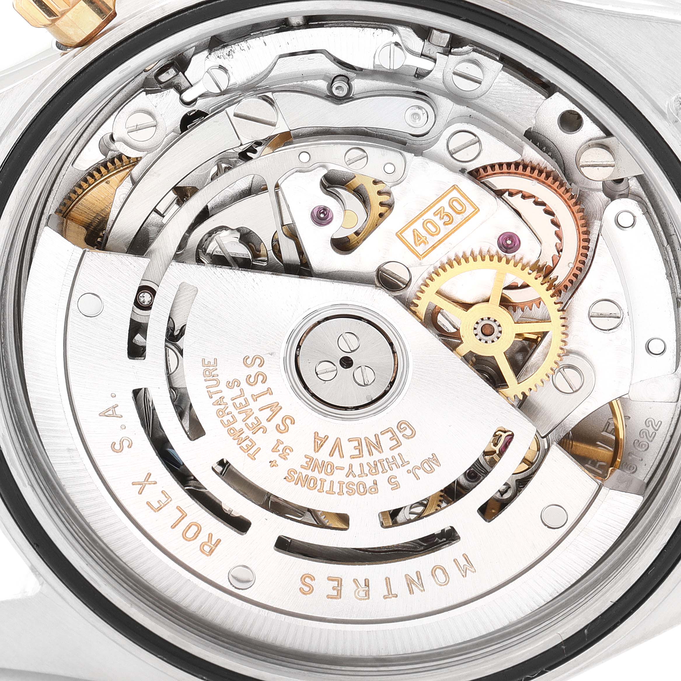 This image shows the detailed internal mechanism of a Rolex Daytona 16523 Men
s Steel and Gold (two tone) White Dial 16523 Men
s Steel and Gold (two tone) White Dial watch, highlighting its intricate gears and components.