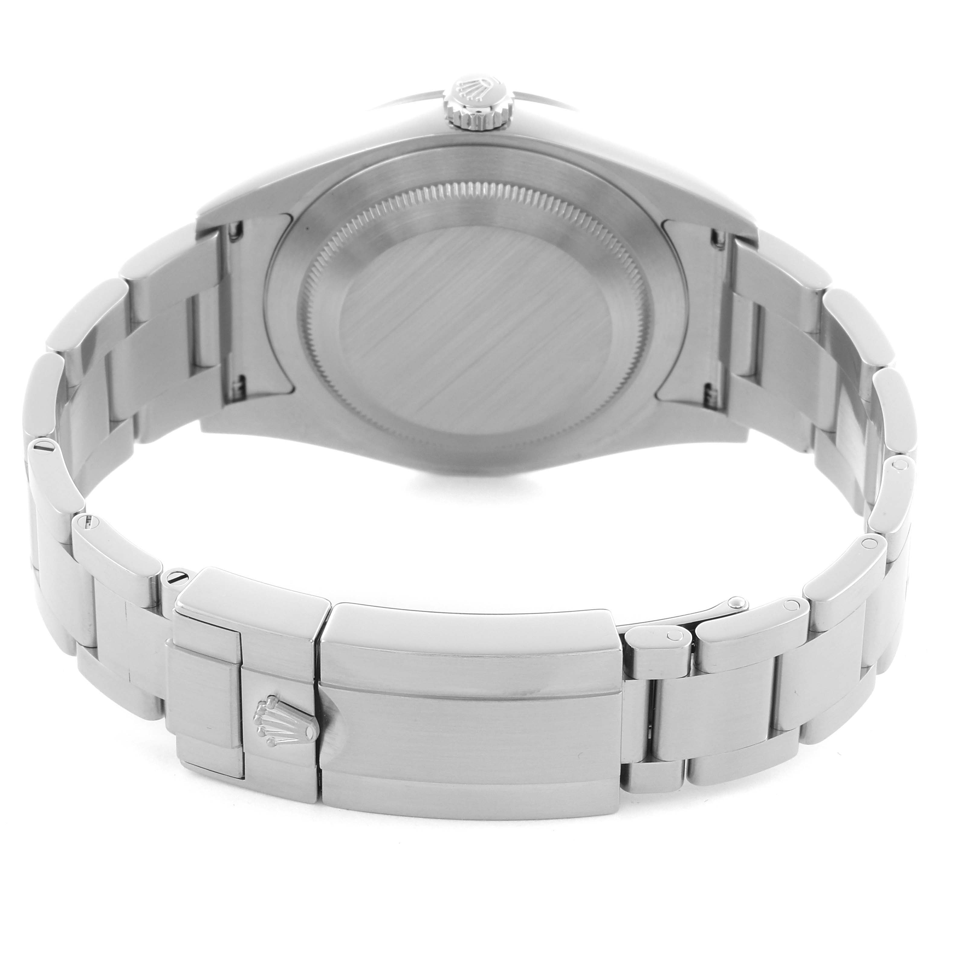 The Rolex Explorer 214270 Men
s Stainless Steel Black Dial 214270 Men
s Stainless Steel Black Dial watch is shown from the back, highlighting the case back, bracelet, and clasp.