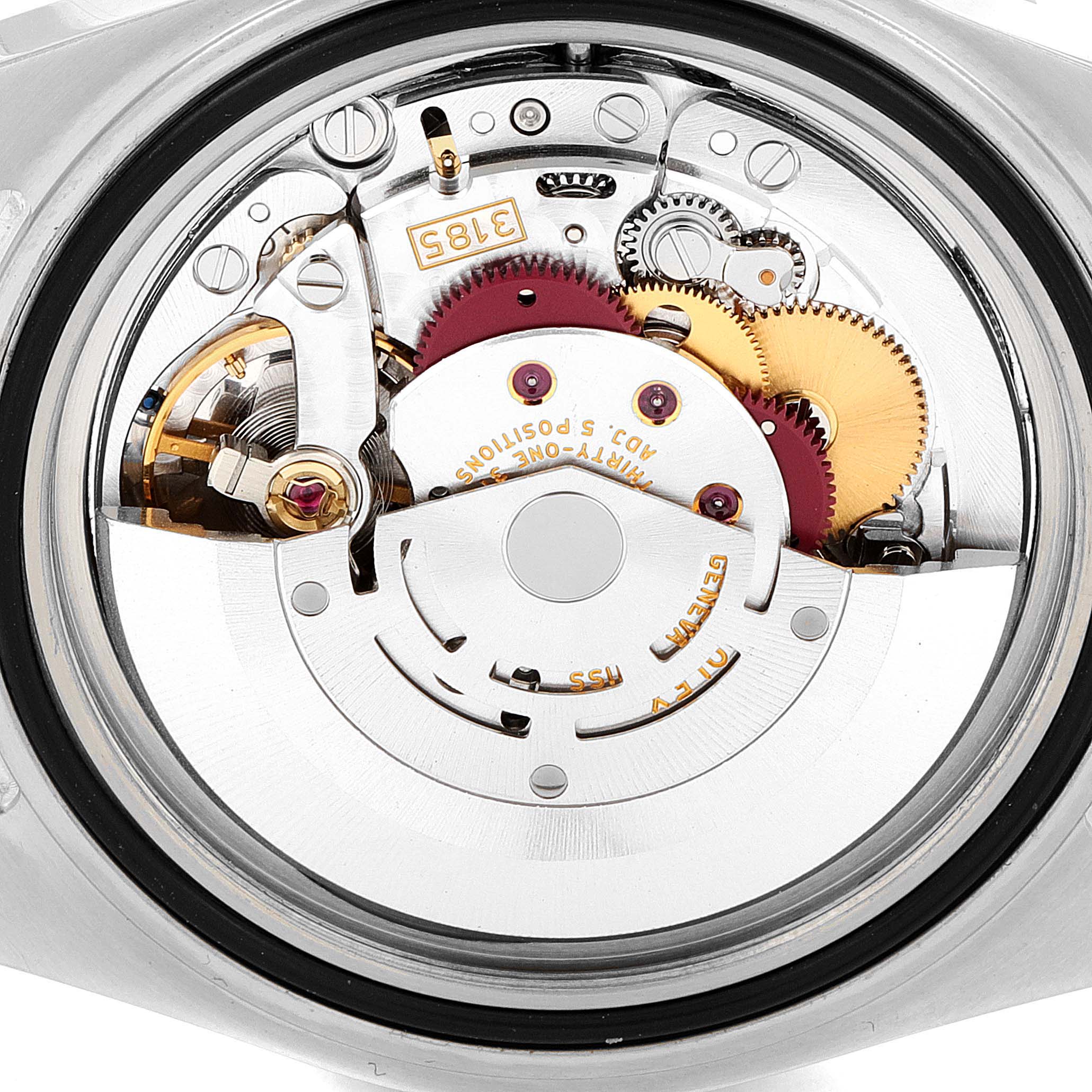 The image shows the back case view of the Rolex GMT-Master 16710 Men
s Stainless Steel Black Dial 16710 Men
s Stainless Steel Black Dial watch, revealing its intricate movement and internal components.