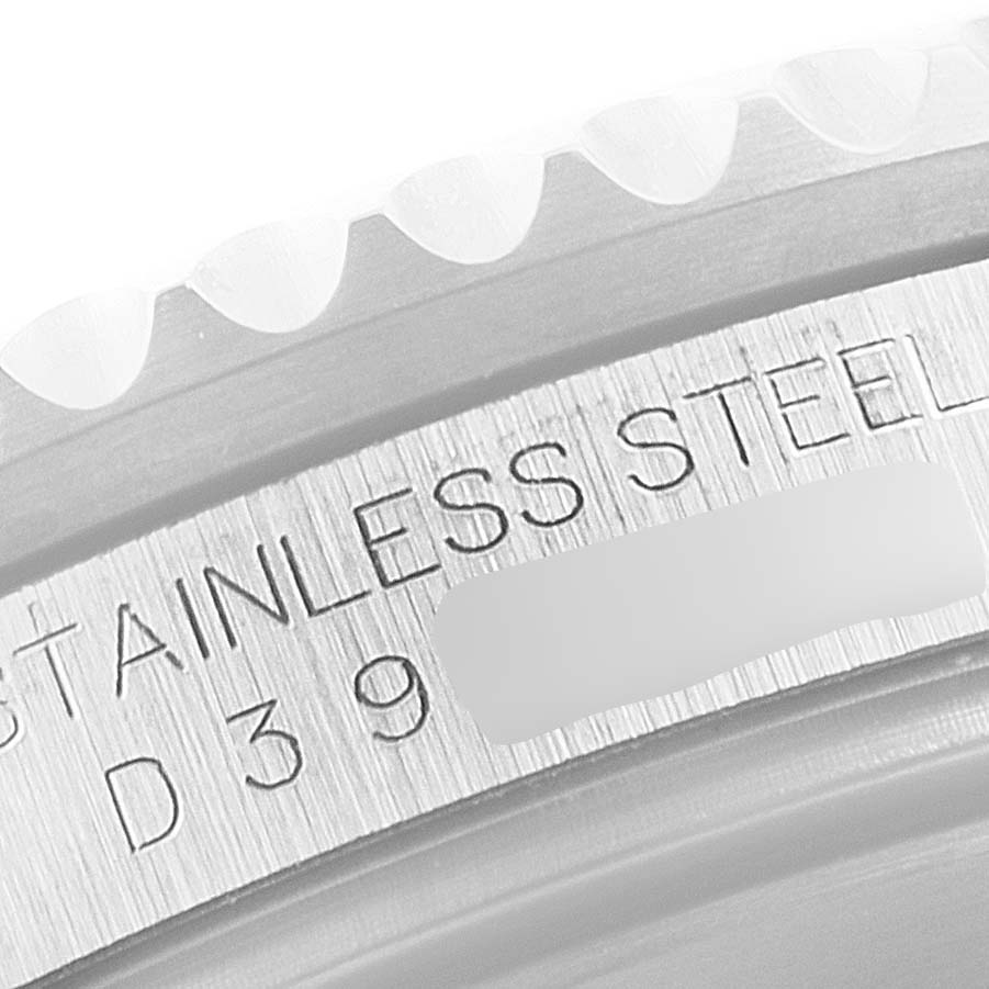 This close-up image shows the edge of the bezel and the stainless steel inscription on the Rolex GMT-Master 16710 Men
s Stainless Steel Black Dial 16710 Men
s Stainless Steel Black Dial watch case.