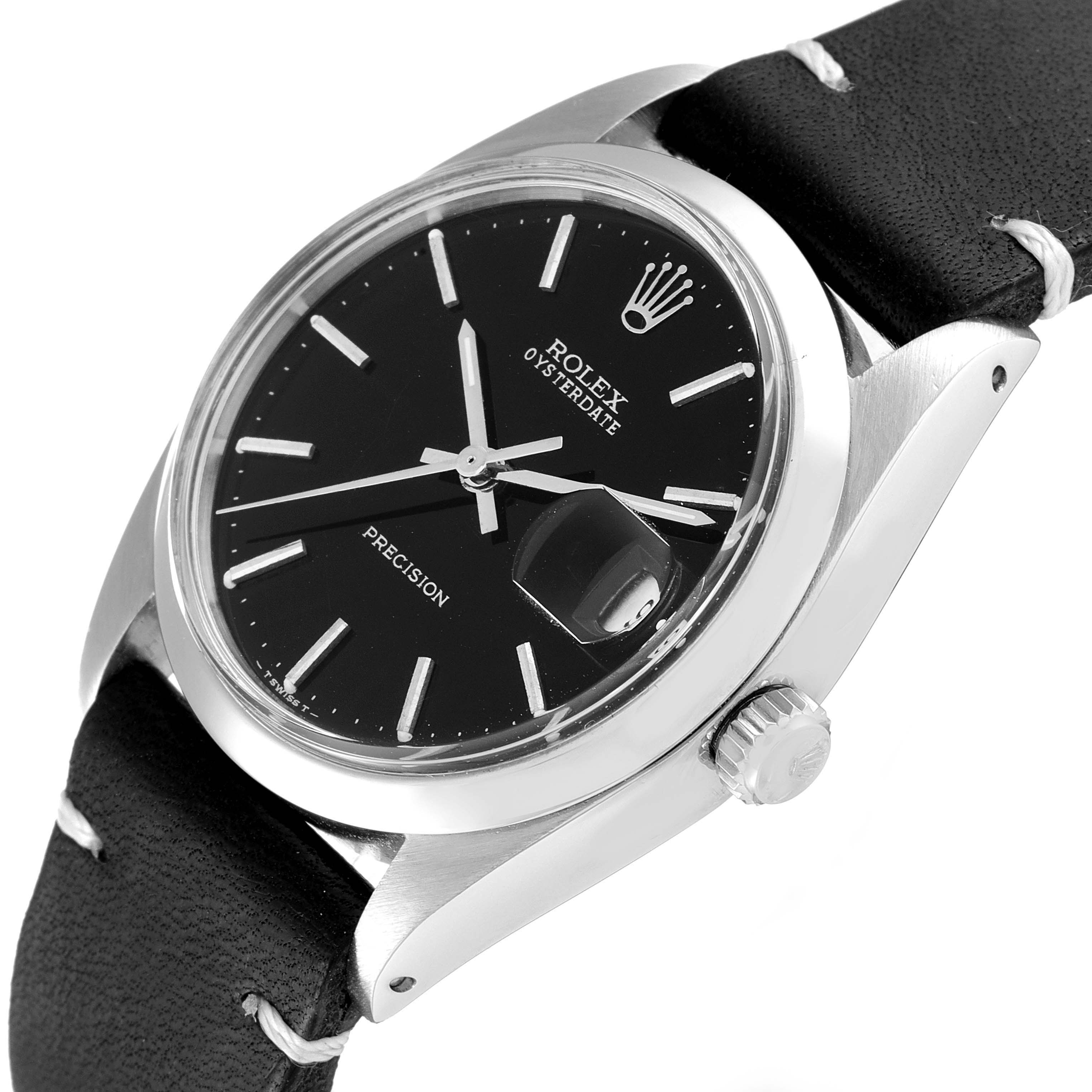 The image shows a Rolex Vintage Collection 6694 Men's Stainless Steel Black Dial 6694 Men's Stainless Steel Black Dial watch from a slight angled view, highlighting its black dial, crown, and date magnifier.