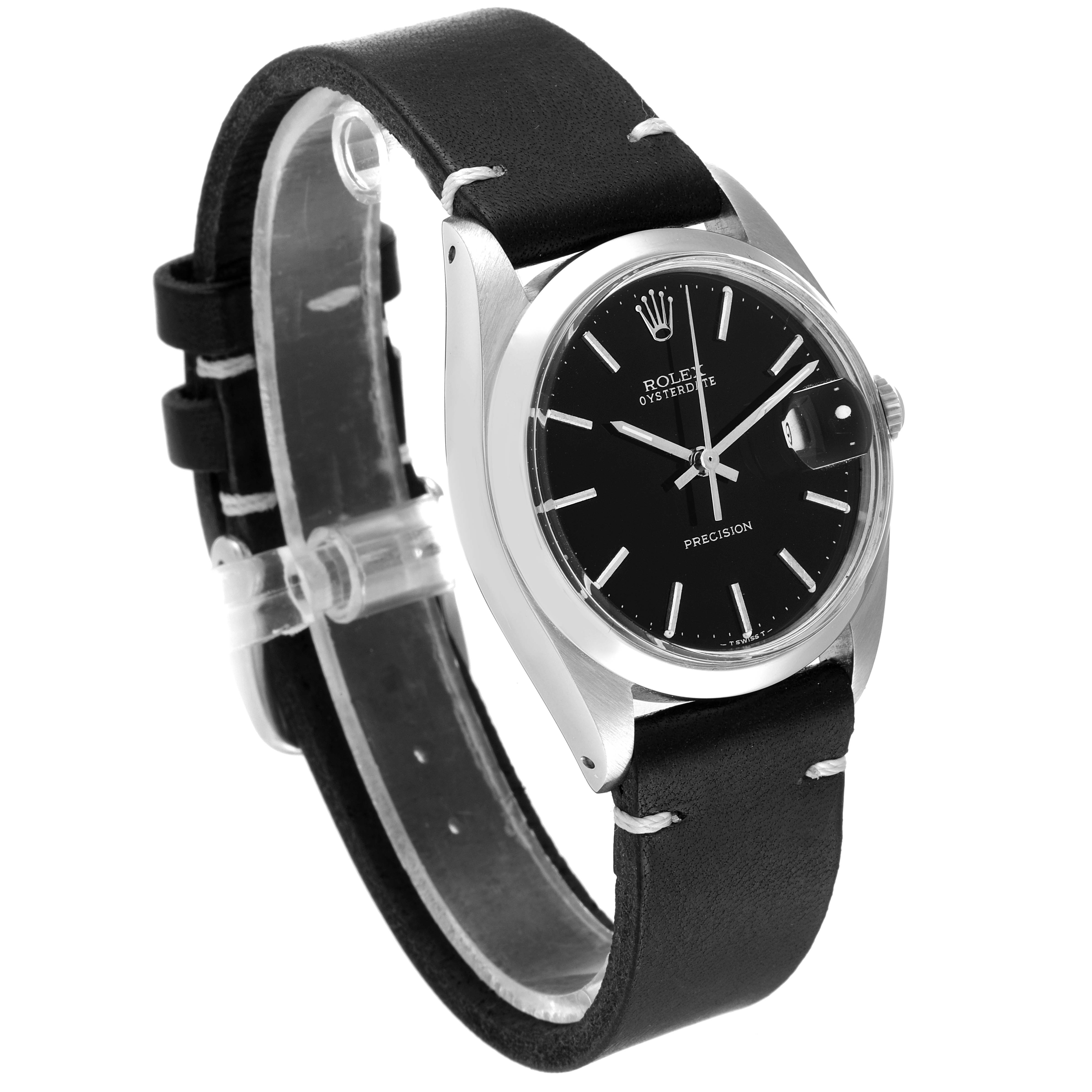 The Vintage Collection Rolex watch is shown at a three-quarter angle, displaying the black dial, silver case, and black leather strap.