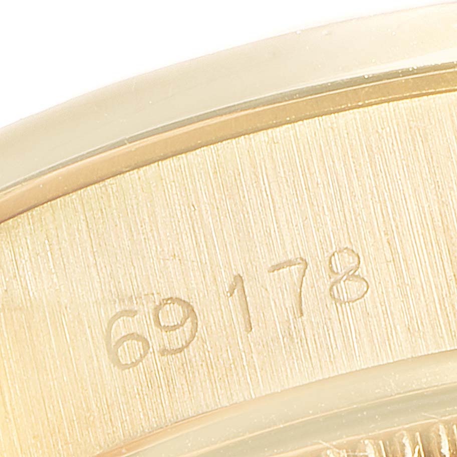 The image shows a close-up of the inner case back of a Rolex President 69178 Women
s Yellow Gold Champagne Dial 69178 Women
s Yellow Gold Champagne Dial model, featuring the engraved reference number "69178."
