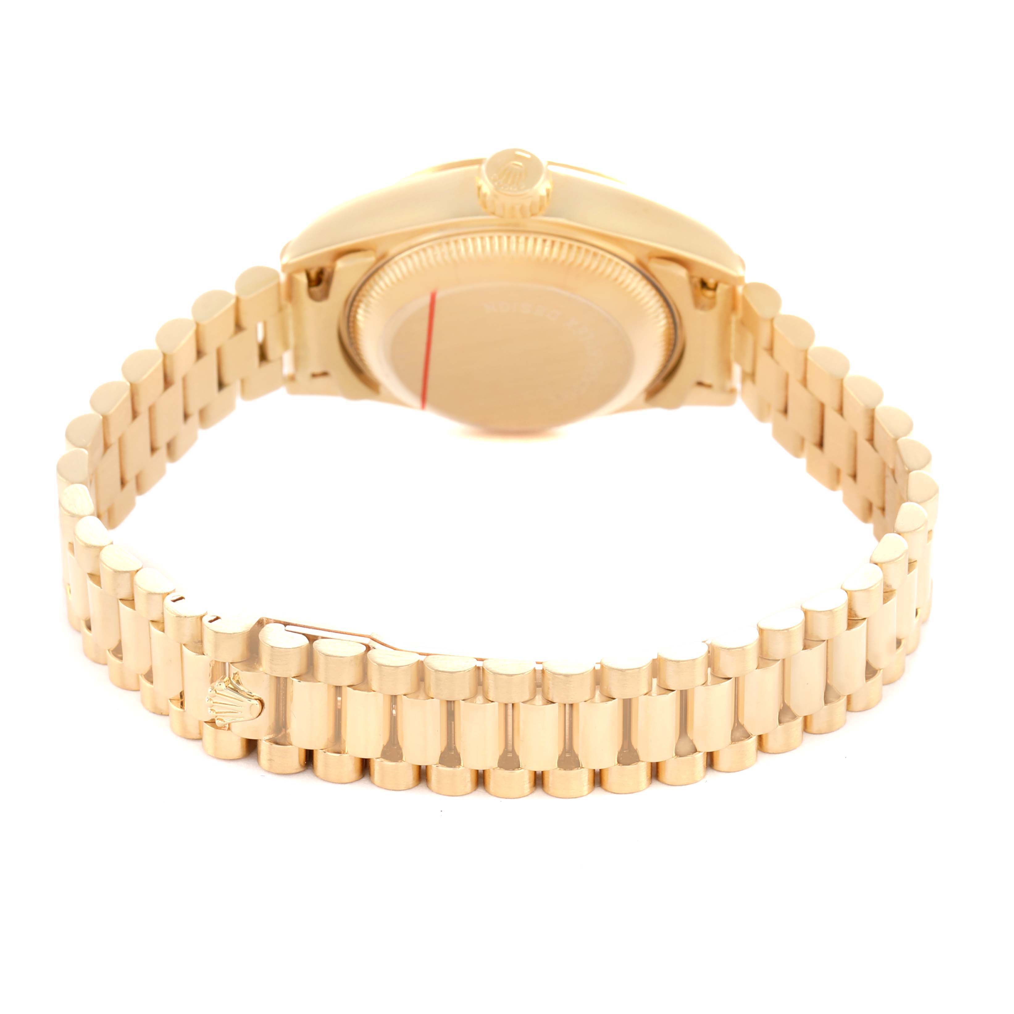 The image shows the back view of a Rolex Datejust 69178 Women's Yellow Gold Champagne Dial, highlighting the bracelet and case back.