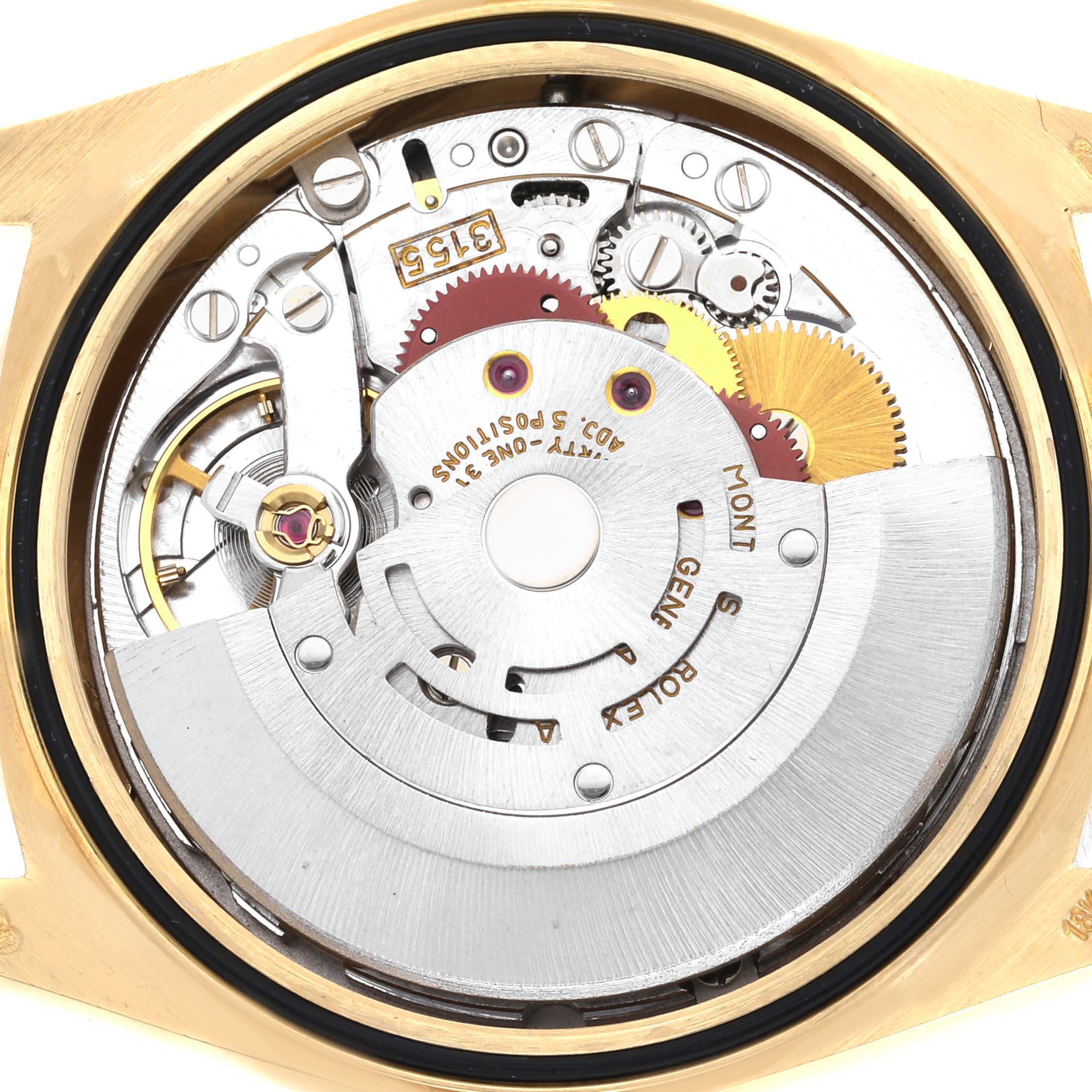 This image shows the intricate movement components of a Rolex President 18238 Men's Yellow Gold Black Dial 18238 Men's Yellow Gold Black Dial model from a top-down angle.