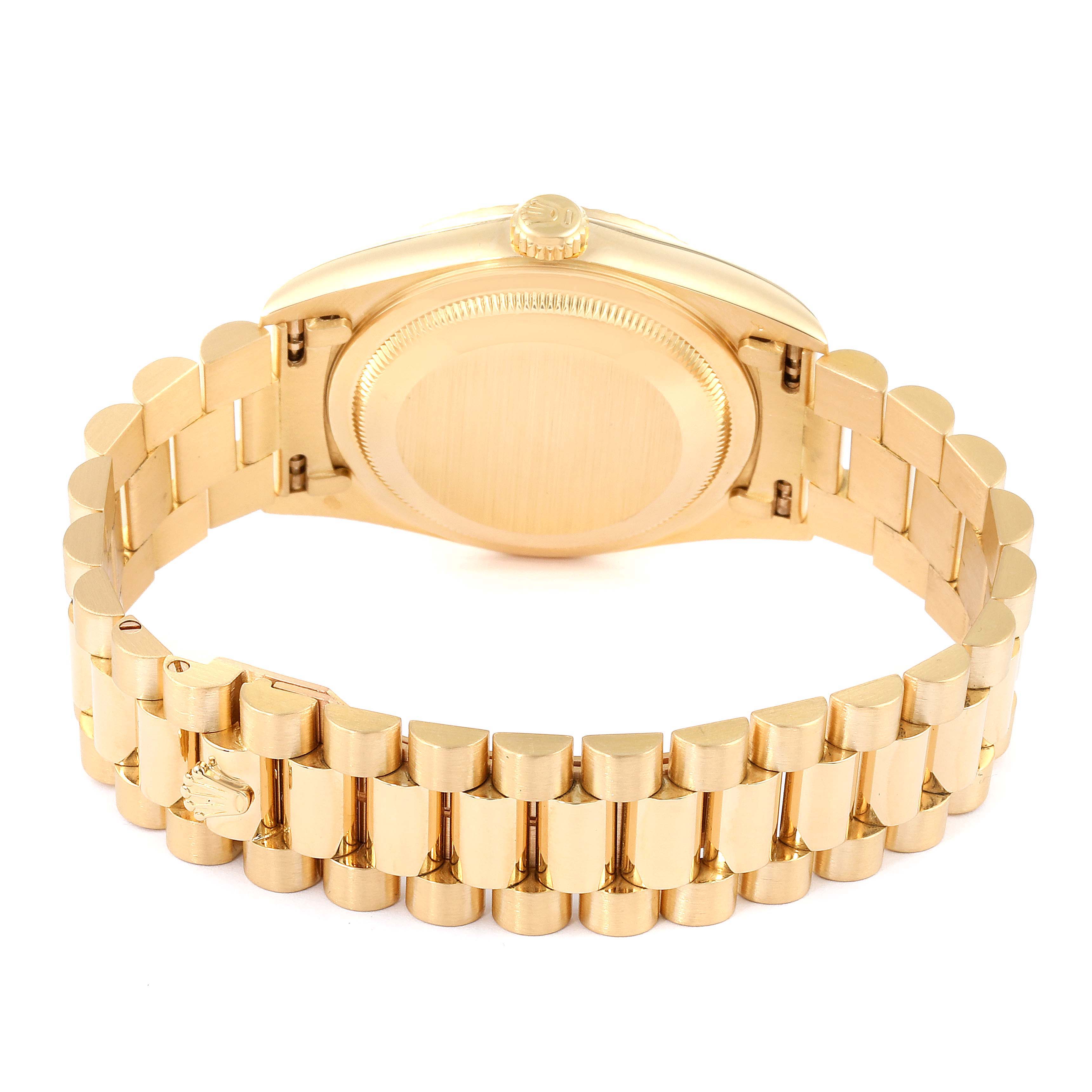 The image shows the back of the Rolex President 18238 Men
s Yellow Gold Champagne Dial 18238 Men
s Yellow Gold Champagne Dial model watch, highlighting the case back and the gold bracelet.