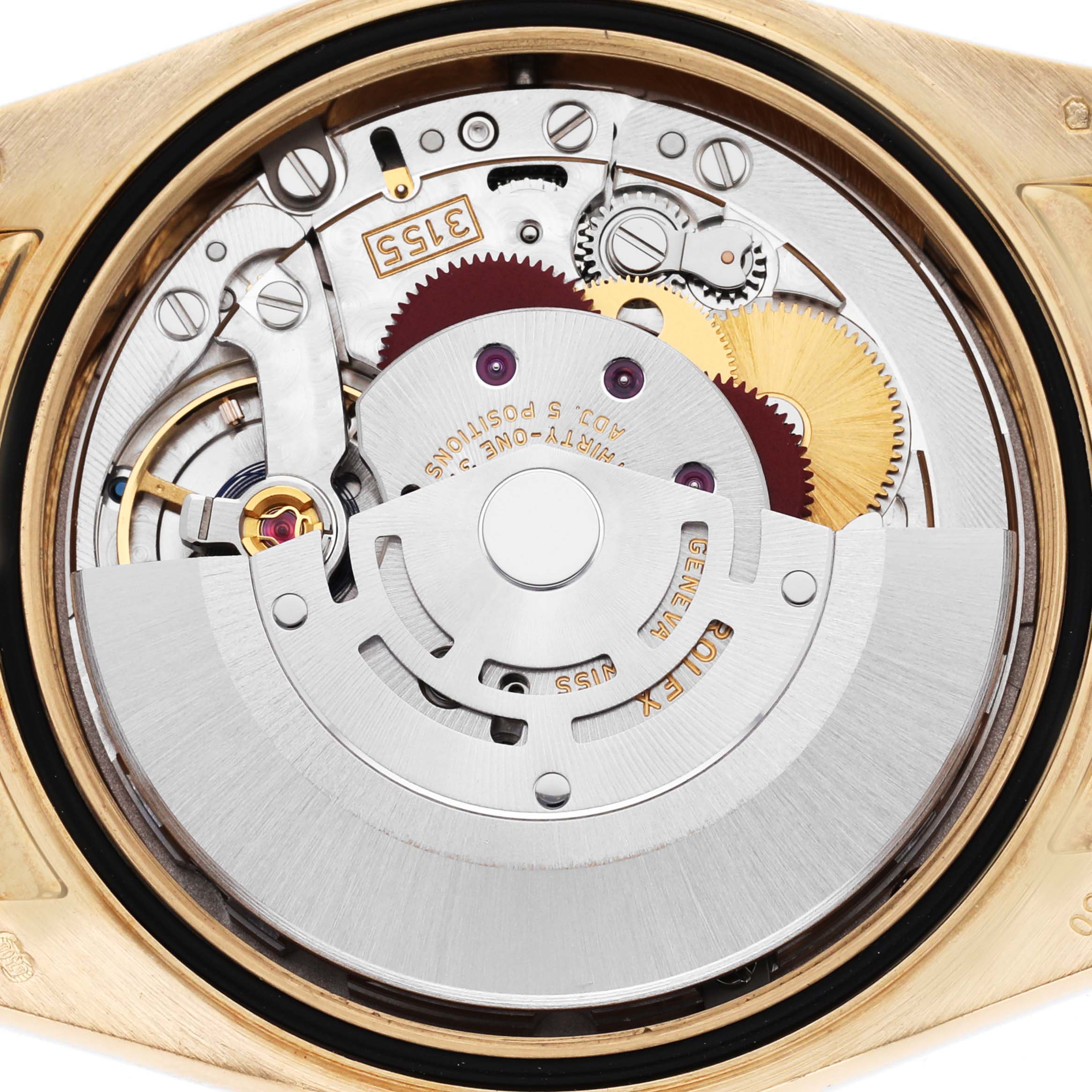 The image shows the internal movement of a Rolex President 118138 Men's Yellow Gold Green Dial model watch from the back, highlighting gears and rotors.
