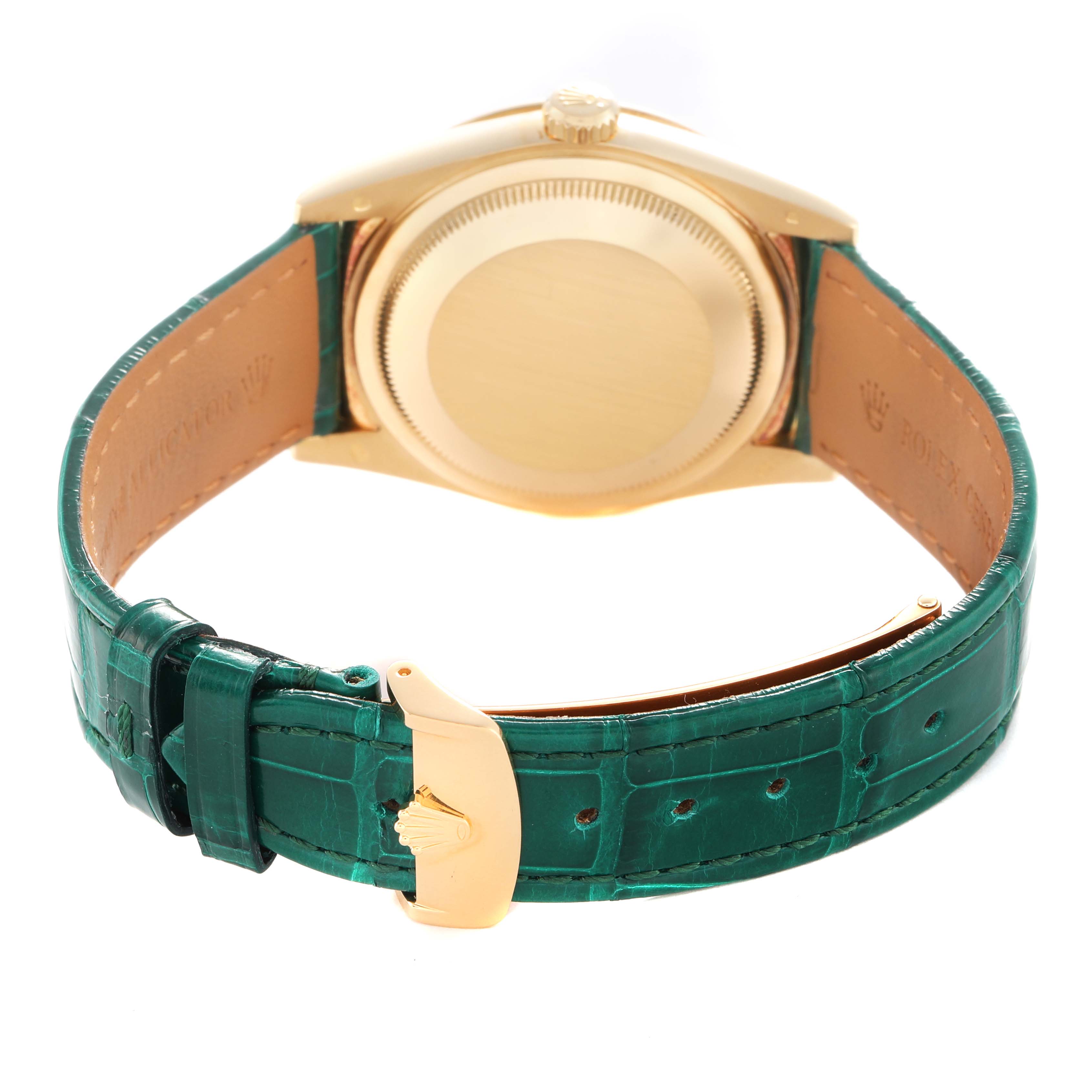 The image shows the back of a Rolex President 118138 Men's Yellow Gold Green Dial watch, highlighting the case back and green leather strap with a gold buckle.
