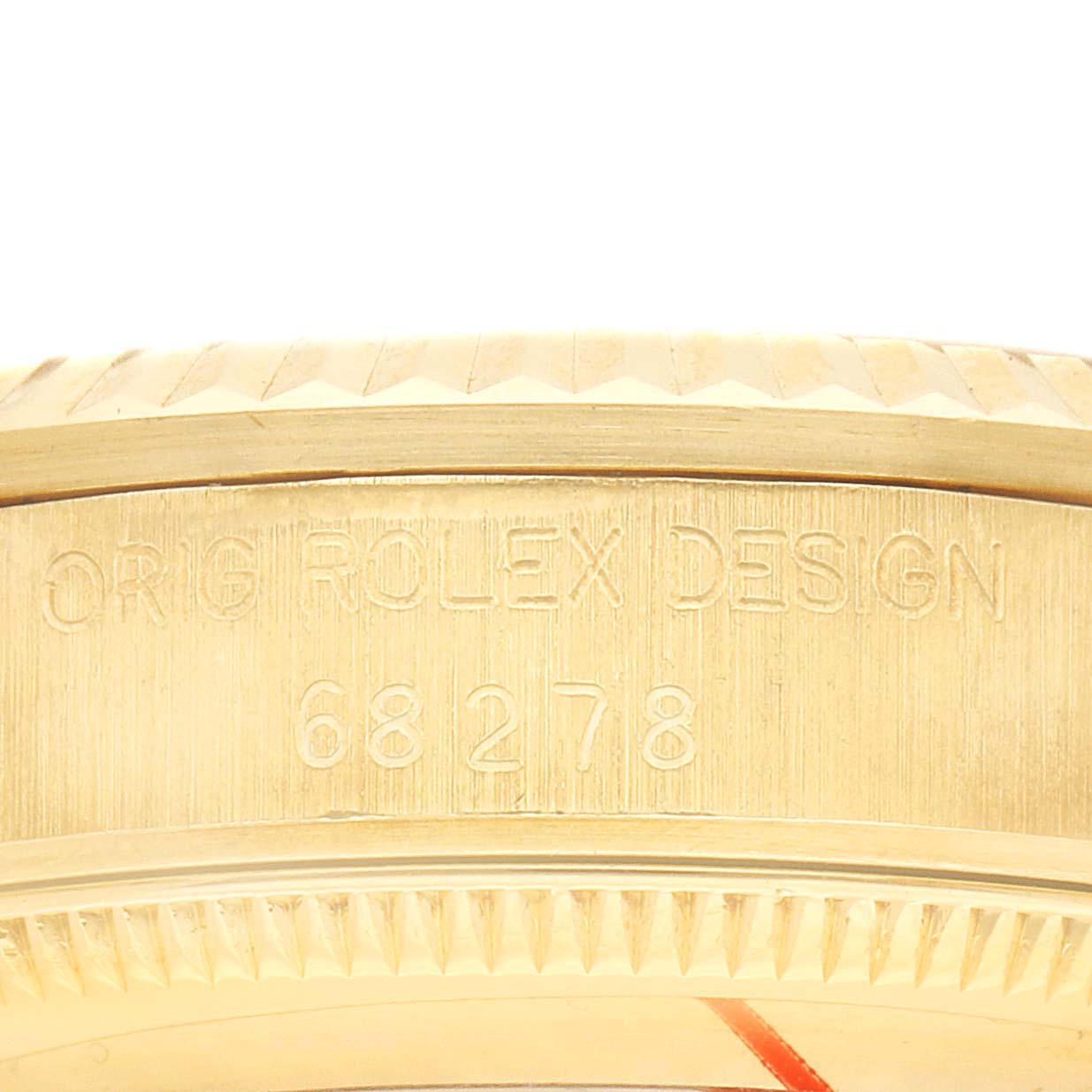 The image shows a close-up of a Rolex Mid-Size 68278 Women's Yellow Gold Champagne Dial watch case, highlighting the model number "68278" engraved on the side.