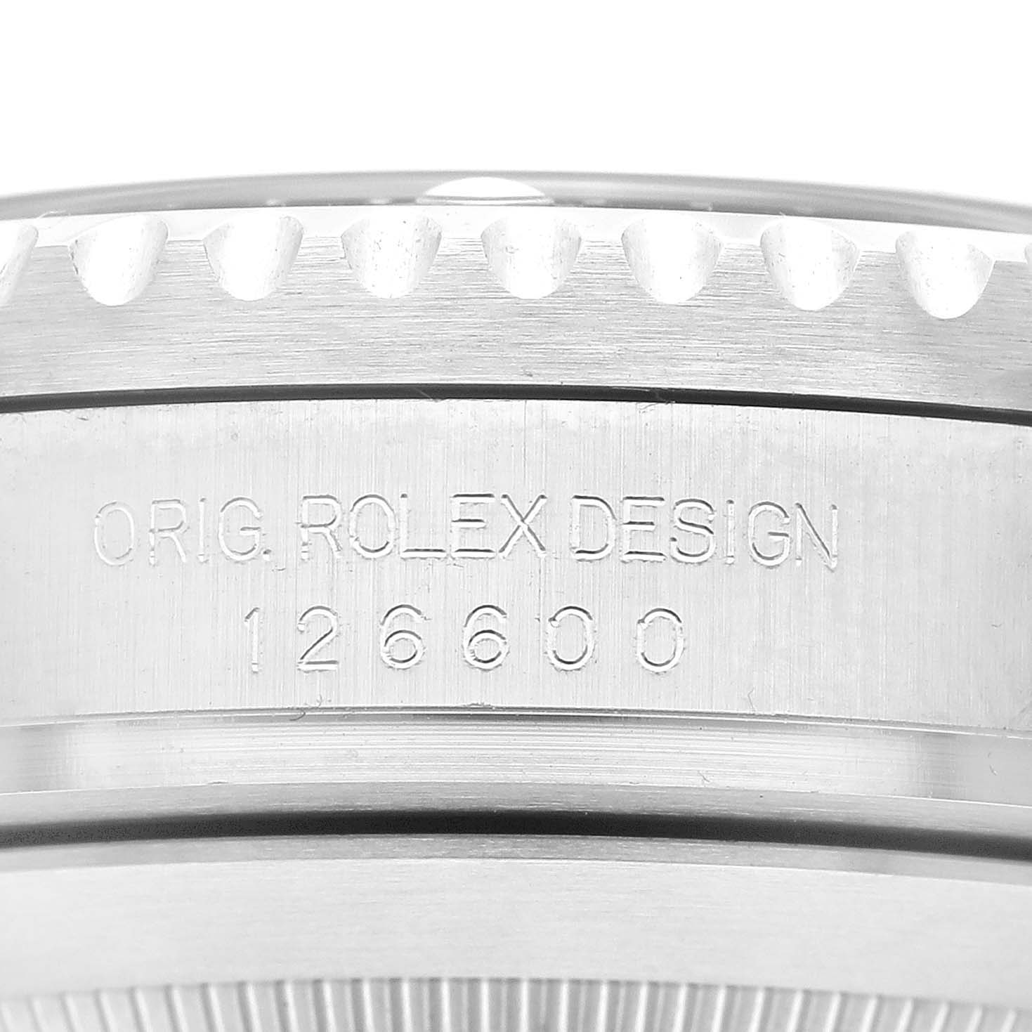 This image shows a close-up of the case side of a Rolex Sea-Dweller 126600 Men
s Stainless Steel Black Dial 126600 Men
s Stainless Steel Black Dial model, highlighting the model number and “ORIG. ROLEX DESIGN” engraving.