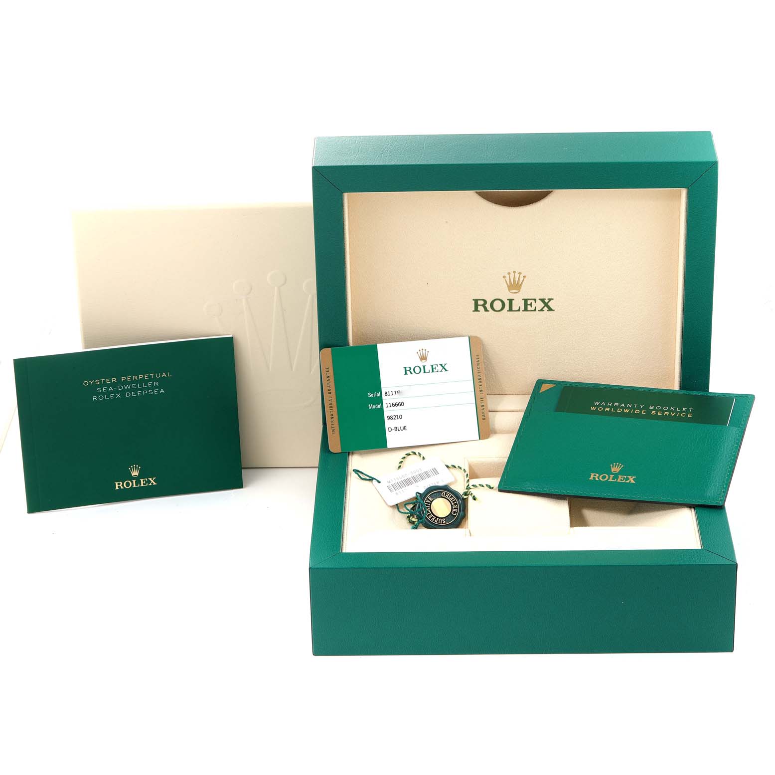 The image shows accessories and packaging for the Rolex Sea-Dweller 116660 Men's Stainless Steel Blue Dial 116660 Men's Stainless Steel Blue Dial model, including the box, warranty card, and booklet.