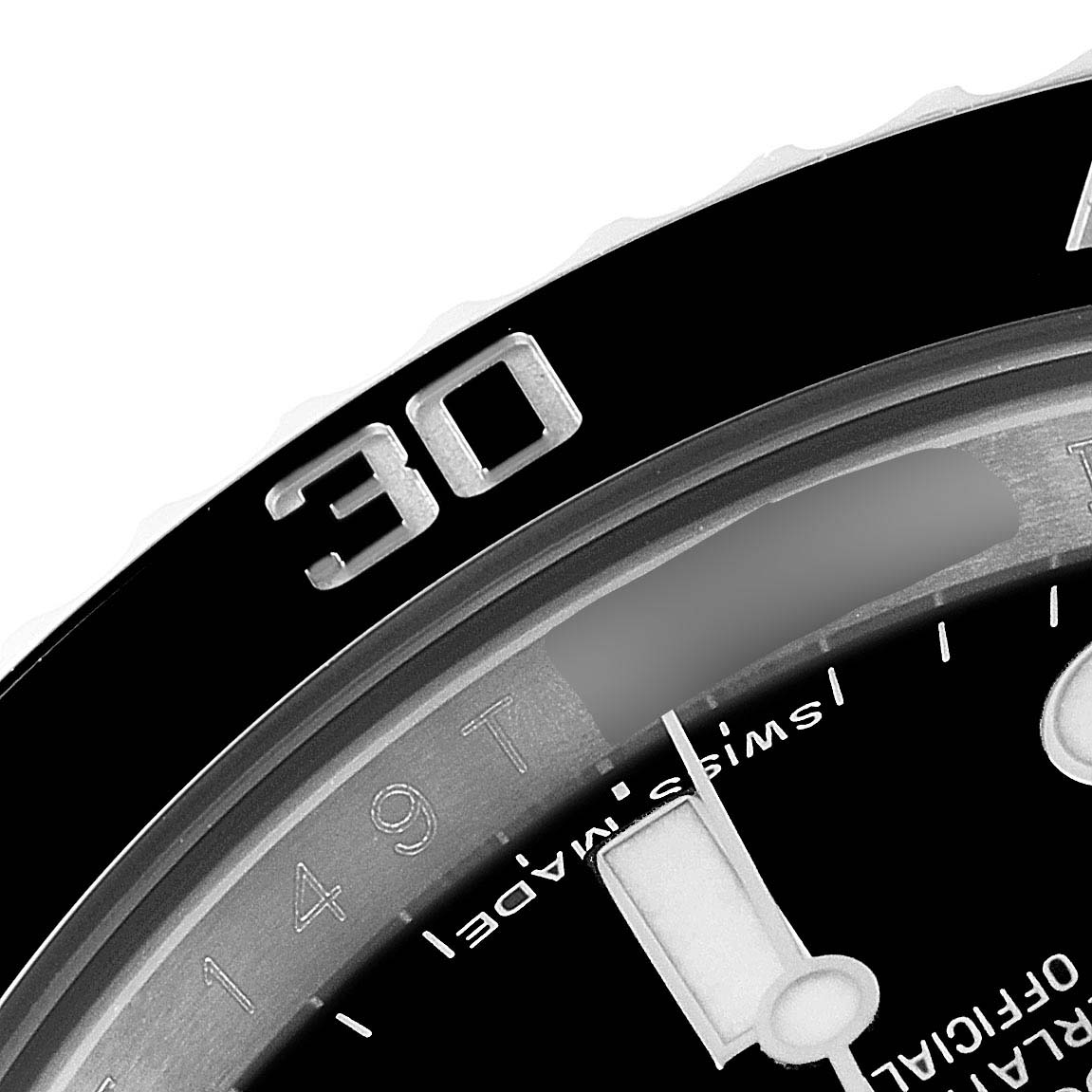 This close-up angle of the Rolex Submariner 114060 Men
s Stainless Steel Black Dial 114060 Men
s Stainless Steel Black Dial watch shows part of the bezel, dial, and minute hand.