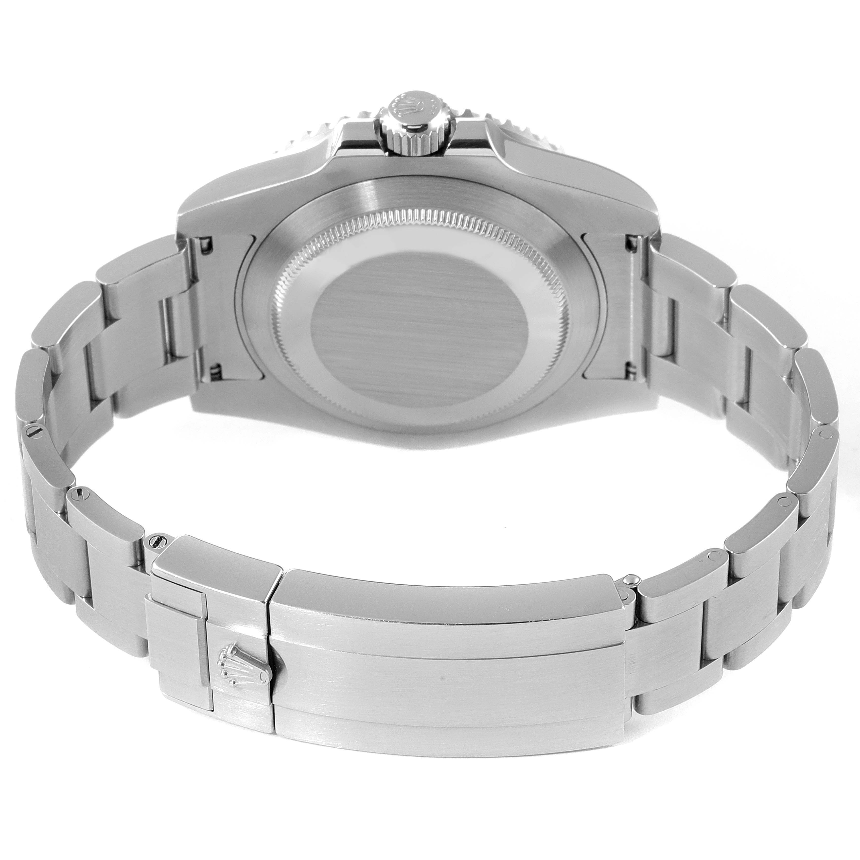 This image shows the back view of a Rolex Submariner 114060 Men
s Stainless Steel Black Dial 114060 Men
s Stainless Steel Black Dial watch, highlighting its caseback, crown, and bracelet clasp.