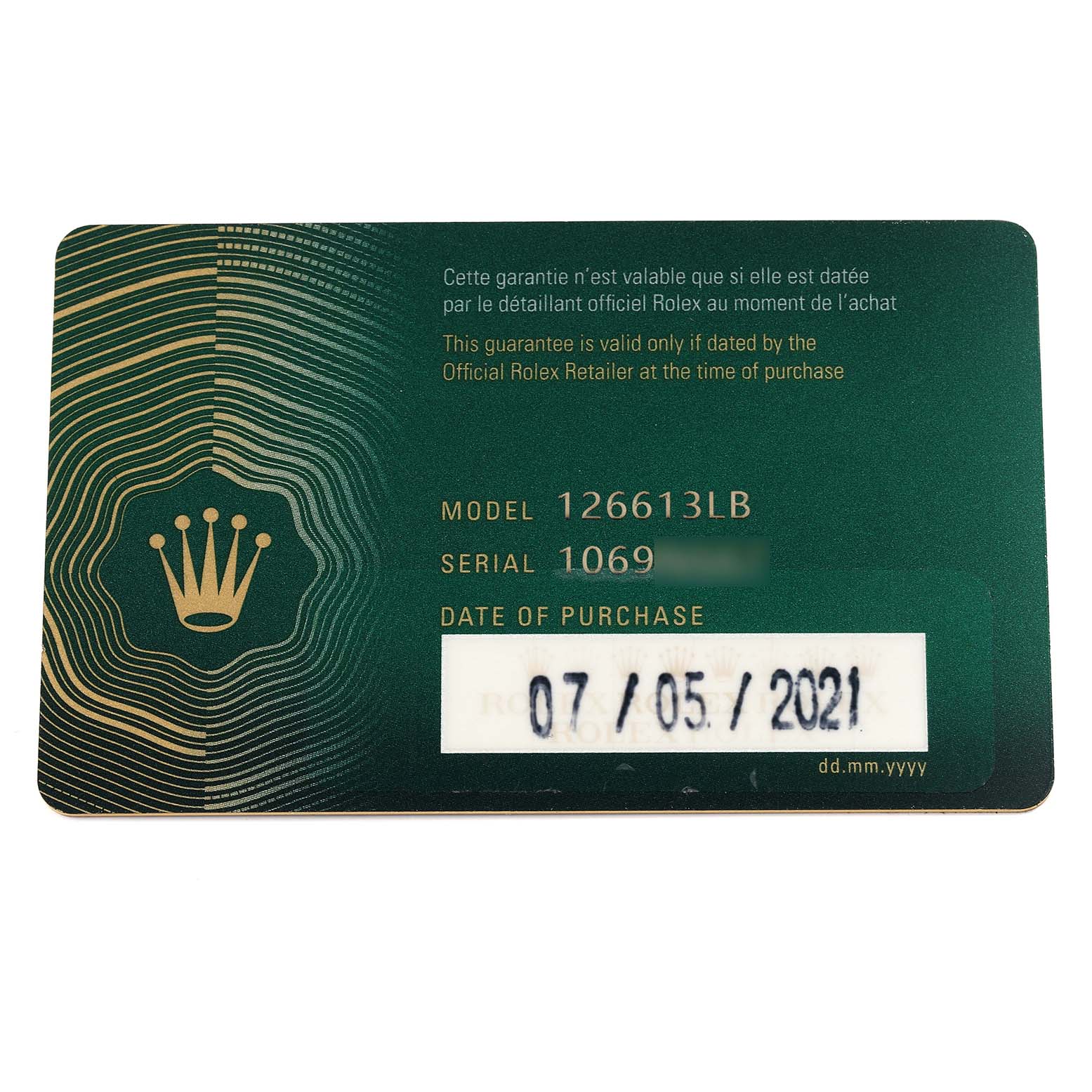 The image shows a Rolex Submariner 126613LB Men's Steel and Gold (two tone) Blue Dial 126613LB Men's Steel and Gold (two tone) Blue Dial warranty card with model and serial information.