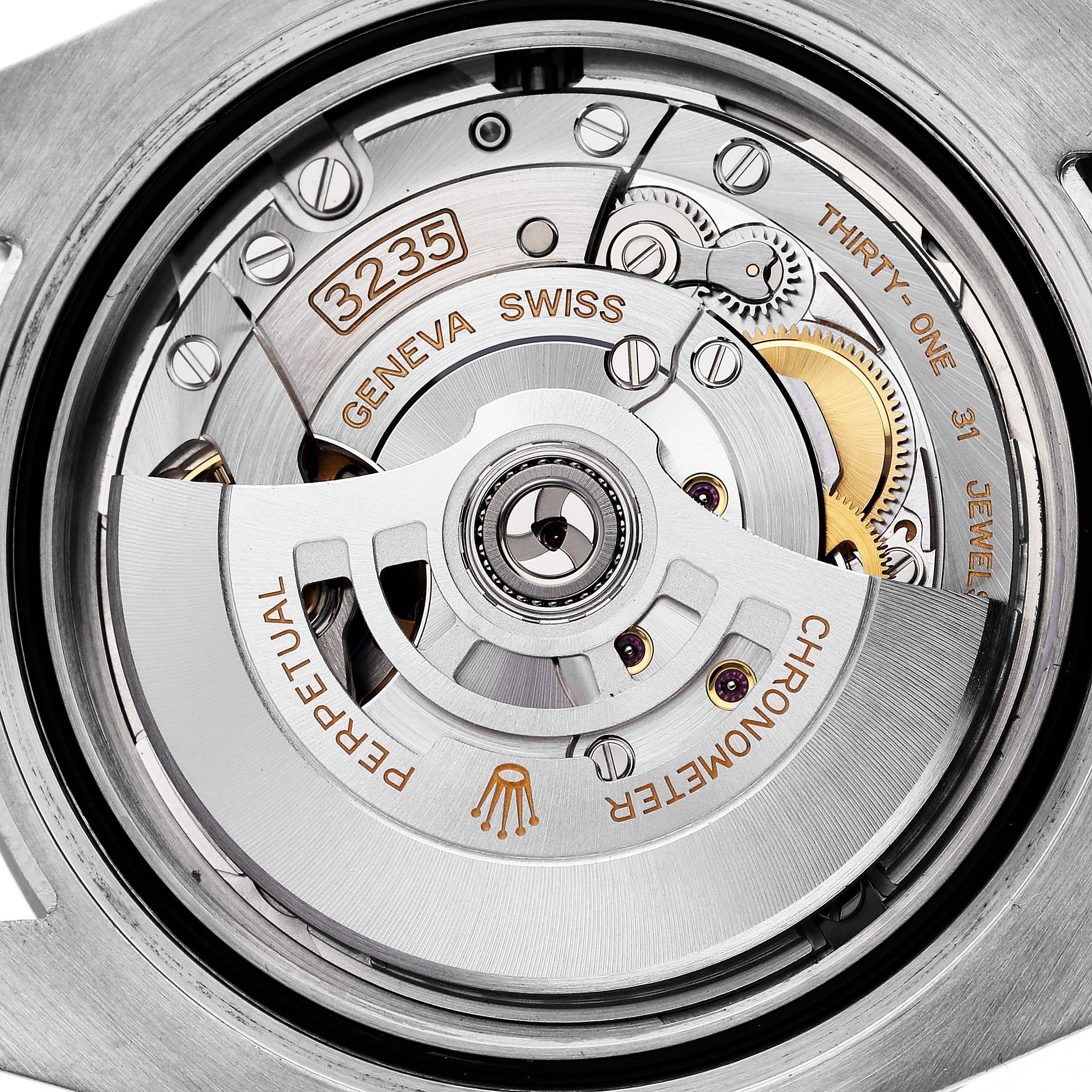 The image shows the Rolex Submariner 126613LB Men's Steel and Gold (two tone) Blue Dial 126613LB Men's Steel and Gold (two tone) Blue Dial's movement, highlighting the intricate internal rotor and mechanical parts at a detailed angle.