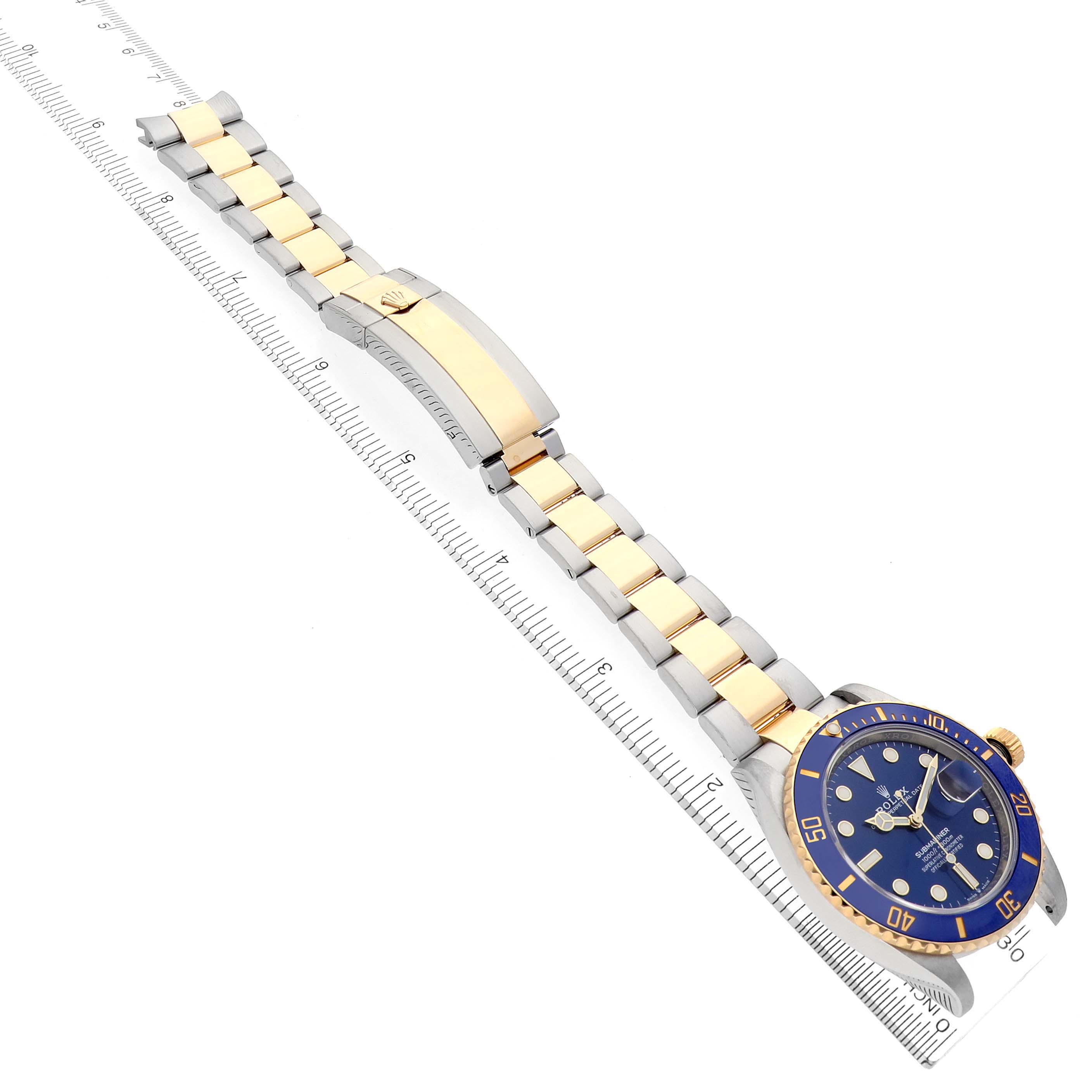 The Rolex Submariner 126613LB Men's Steel and Gold (two tone) Blue Dial 126613LB Men's Steel and Gold (two tone) Blue Dial watch is shown at a diagonal angle, displaying the blue dial, bezel, and two-tone bracelet.