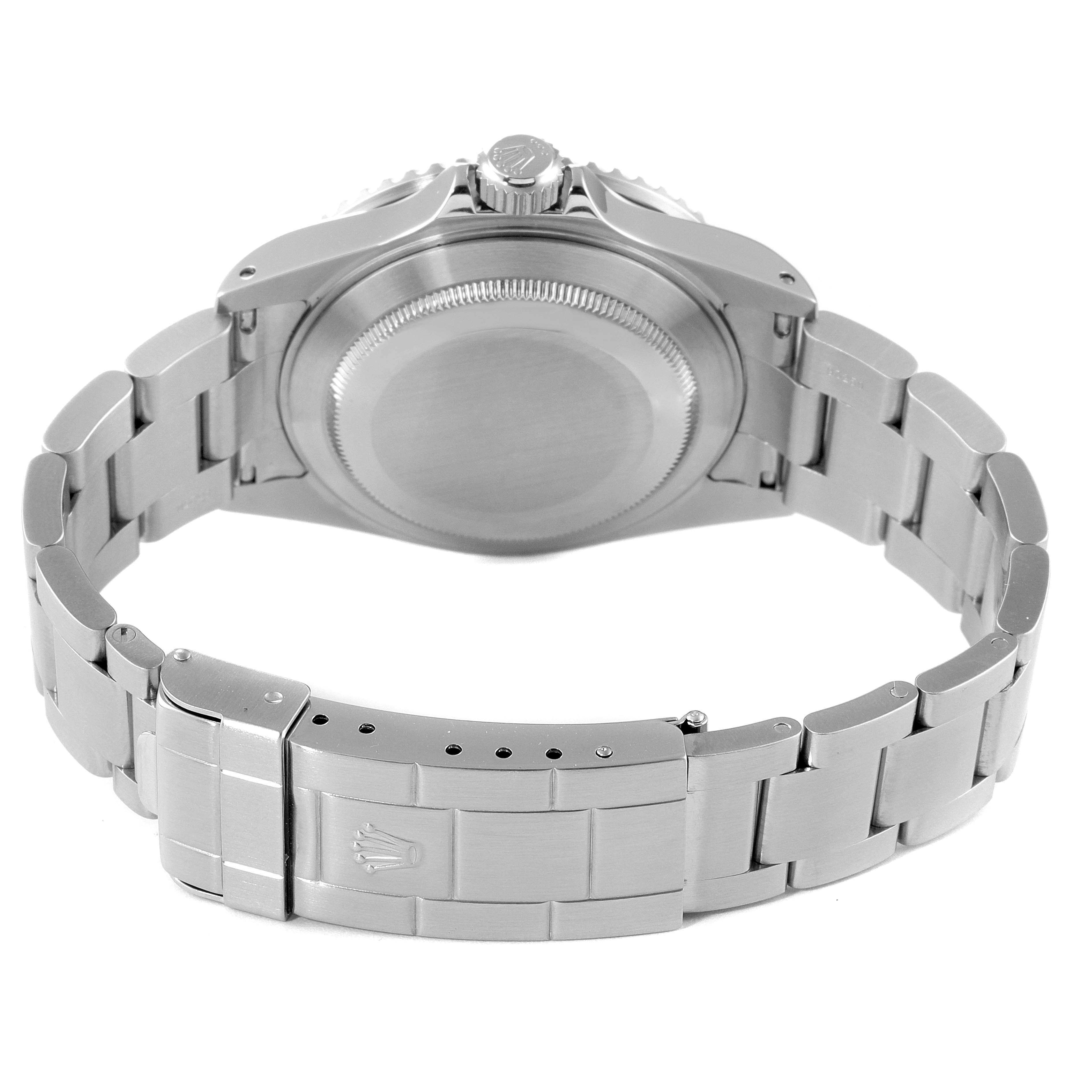 The image shows the underside of a Rolex Submariner 16610 Men's Stainless Steel Black Dial 16610 Men's Stainless Steel Black Dial watch, highlighting the bracelet and case back.