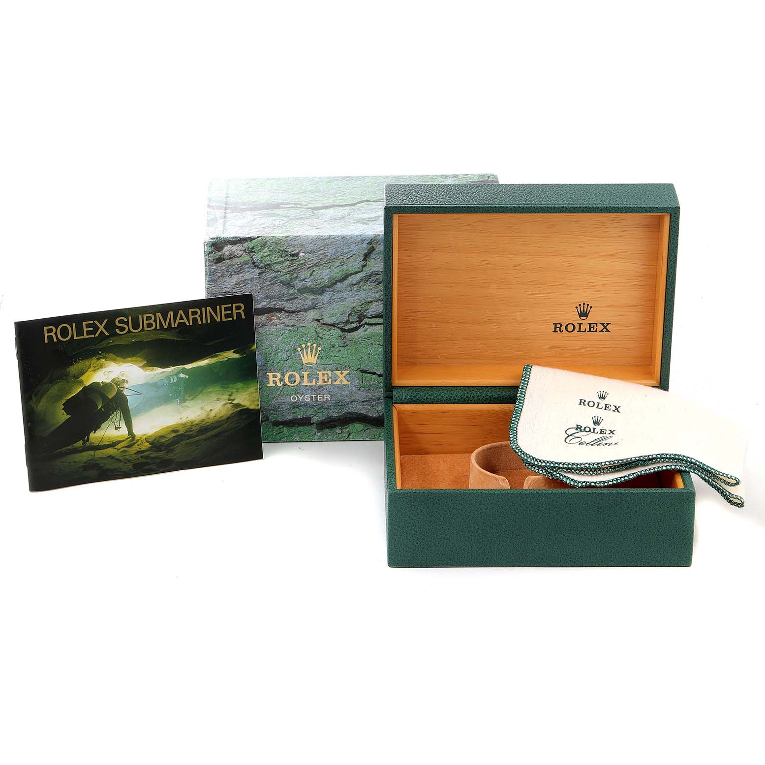 This image shows the packaging, warranty booklet, and cleaning cloth for a Rolex Submariner 16610 Men's Stainless Steel Black Dial 16610 Men's Stainless Steel Black Dial watch.