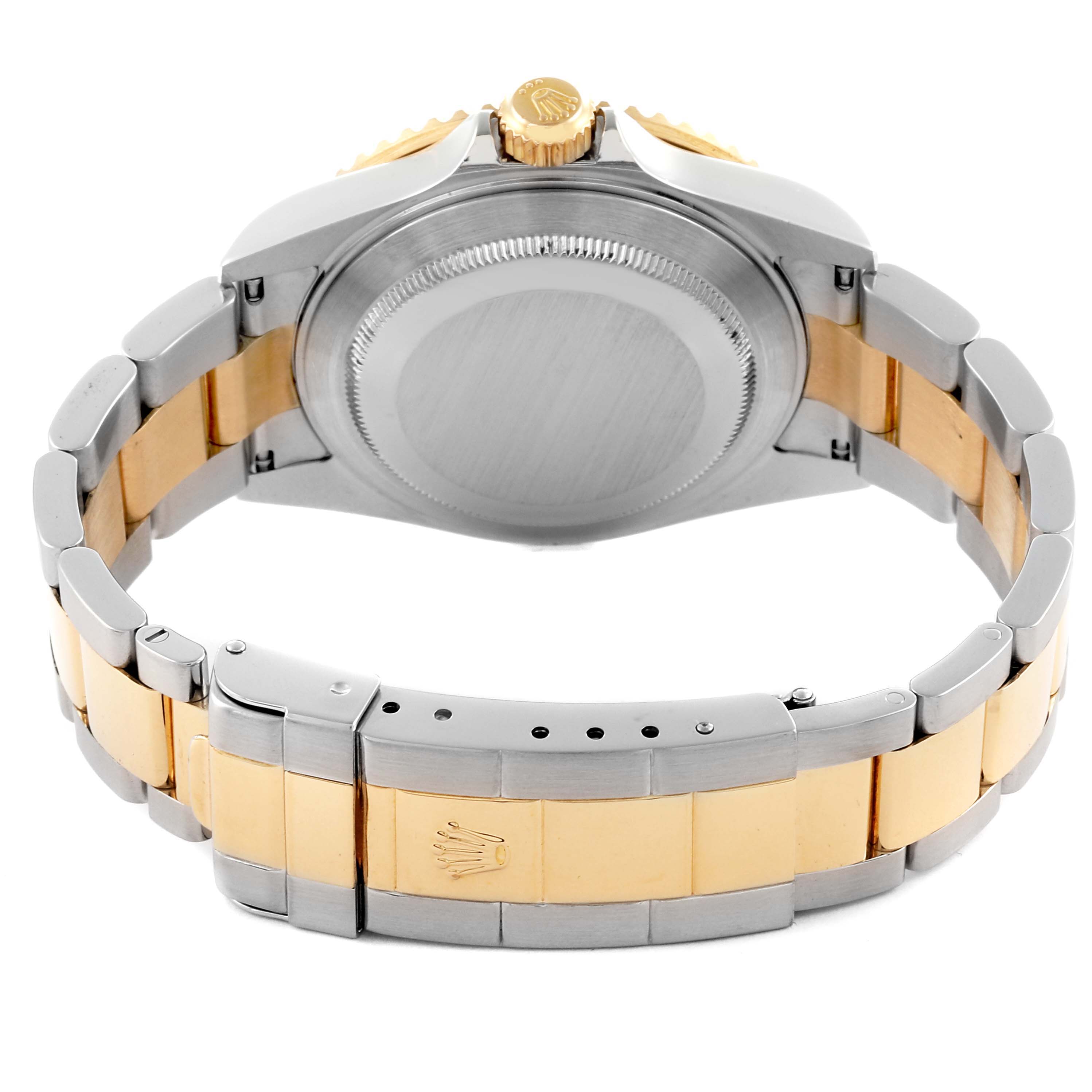 The image shows the back case and the clasp of a Rolex Submariner 16613 Men's Steel and Gold (two tone) Blue Dial 16613 Men's Steel and Gold (two tone) Blue Dial, highlighting its two-tone bracelet design.