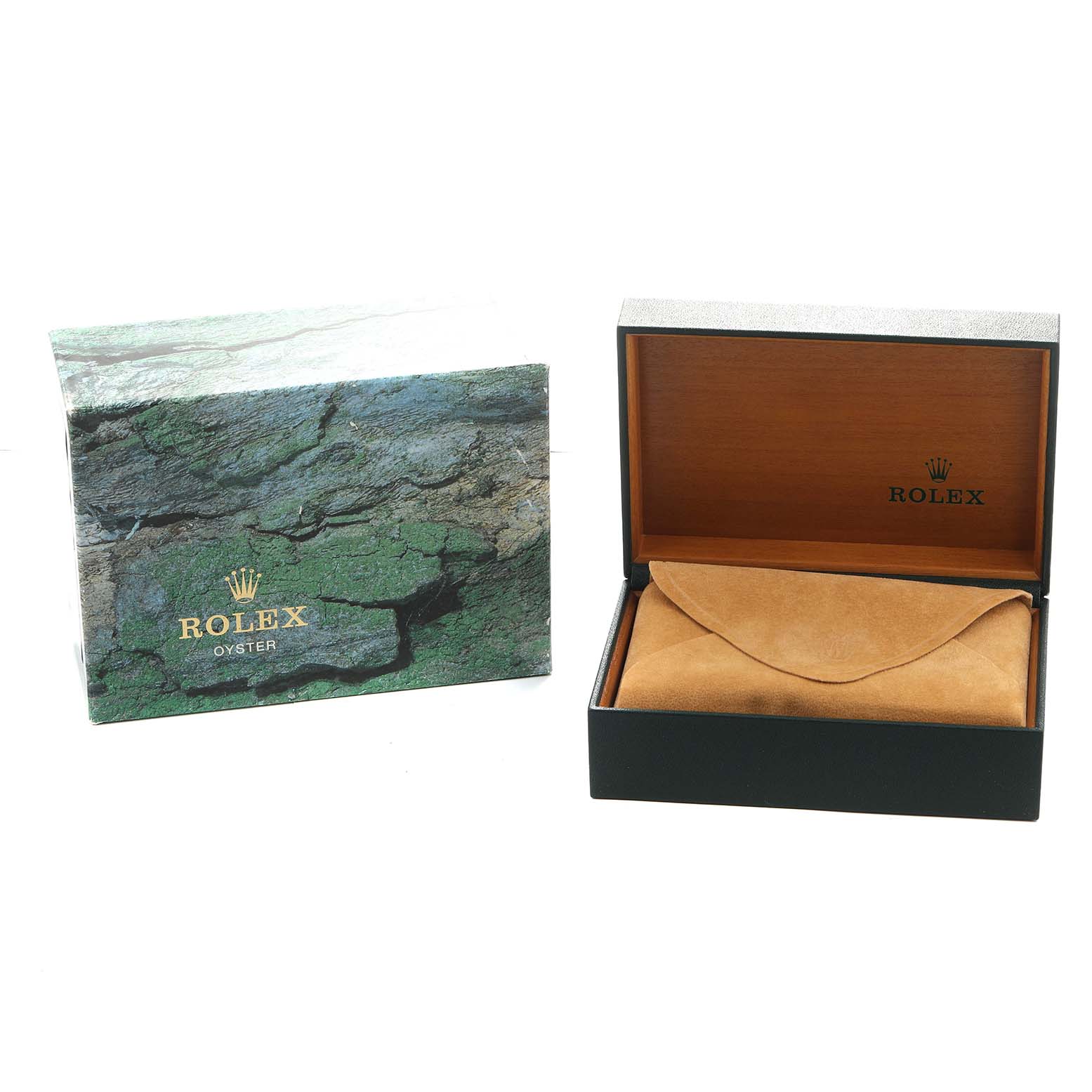 The image shows a Rolex Submariner 16610 Men's Stainless Steel Black Dial watch box and outer packaging, with the box open, revealing a protective pouch.