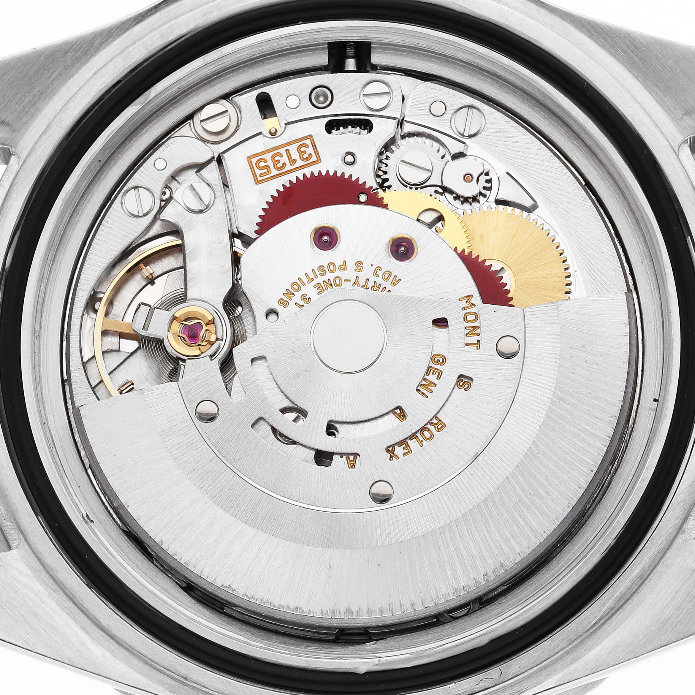 This image shows the movement of a Rolex Submariner 16610 Men's Stainless Steel Black Dial watch from the back, highlighting its intricate gears and components.