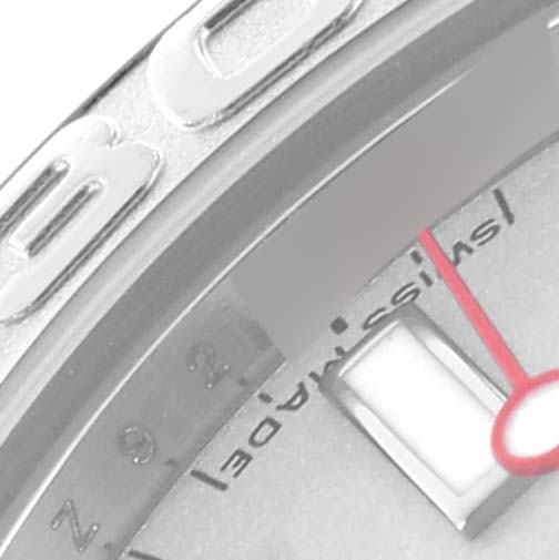 The image shows a close-up of the Rolex Yacht-Master 168622 Men's Stainless Steel Silver Dial 168622 Men's Stainless Steel Silver Dial's bezel and part of the dial with a red second hand.