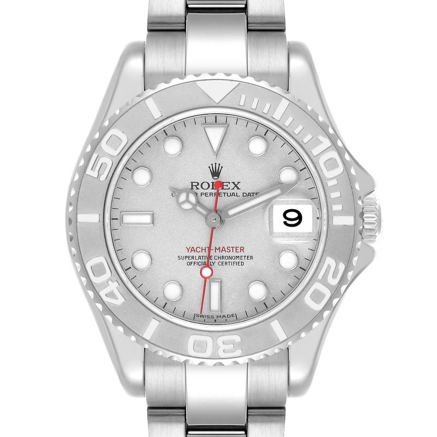 The Rolex Yacht-Master is shown from a top-down angle, displaying the face, bezel, and bracelet.