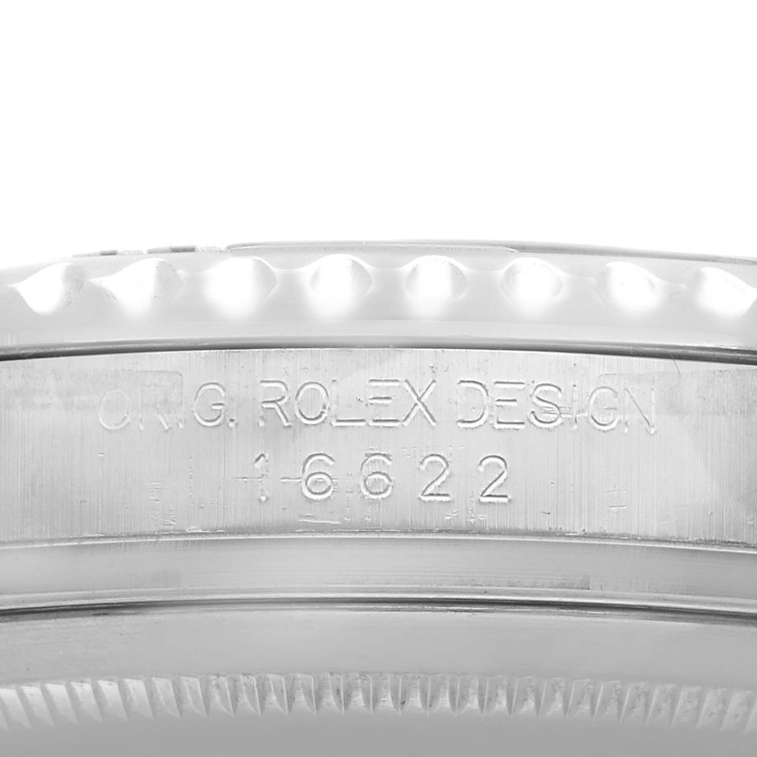 The image shows a close-up of the side of a Rolex Yacht-Master 16622 Men's Stainless Steel Silver Dial watch, highlighting the engraved "Rolex Design 16622."