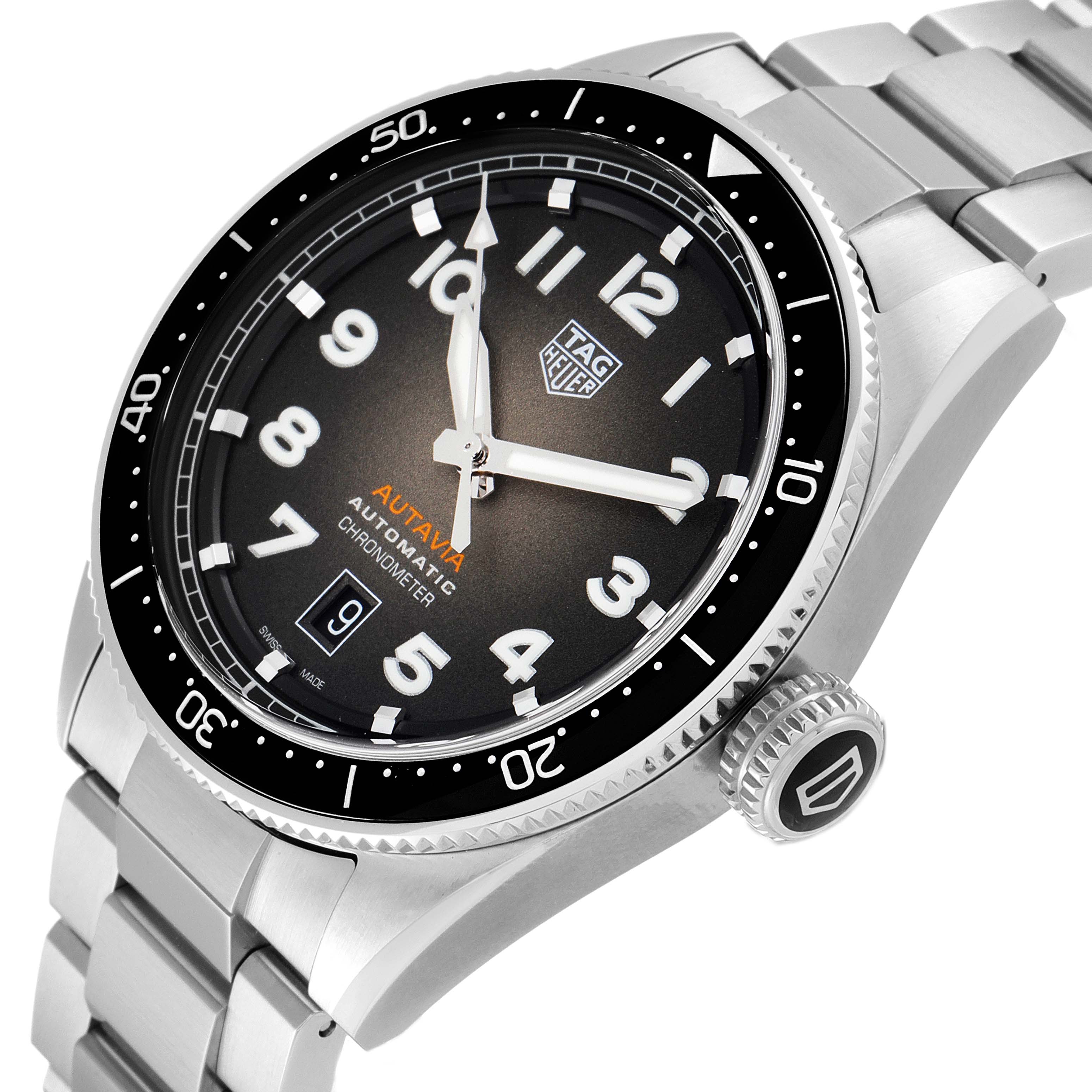 This image shows the Tag Heuer Autavia WBE5114.EB0173 Men's Stainless Steel Brown Dial WBE5114.EB0173 Men's Stainless Steel Brown Dial watch, angled to display the dial, bezel, crown, and part of the bracelet.