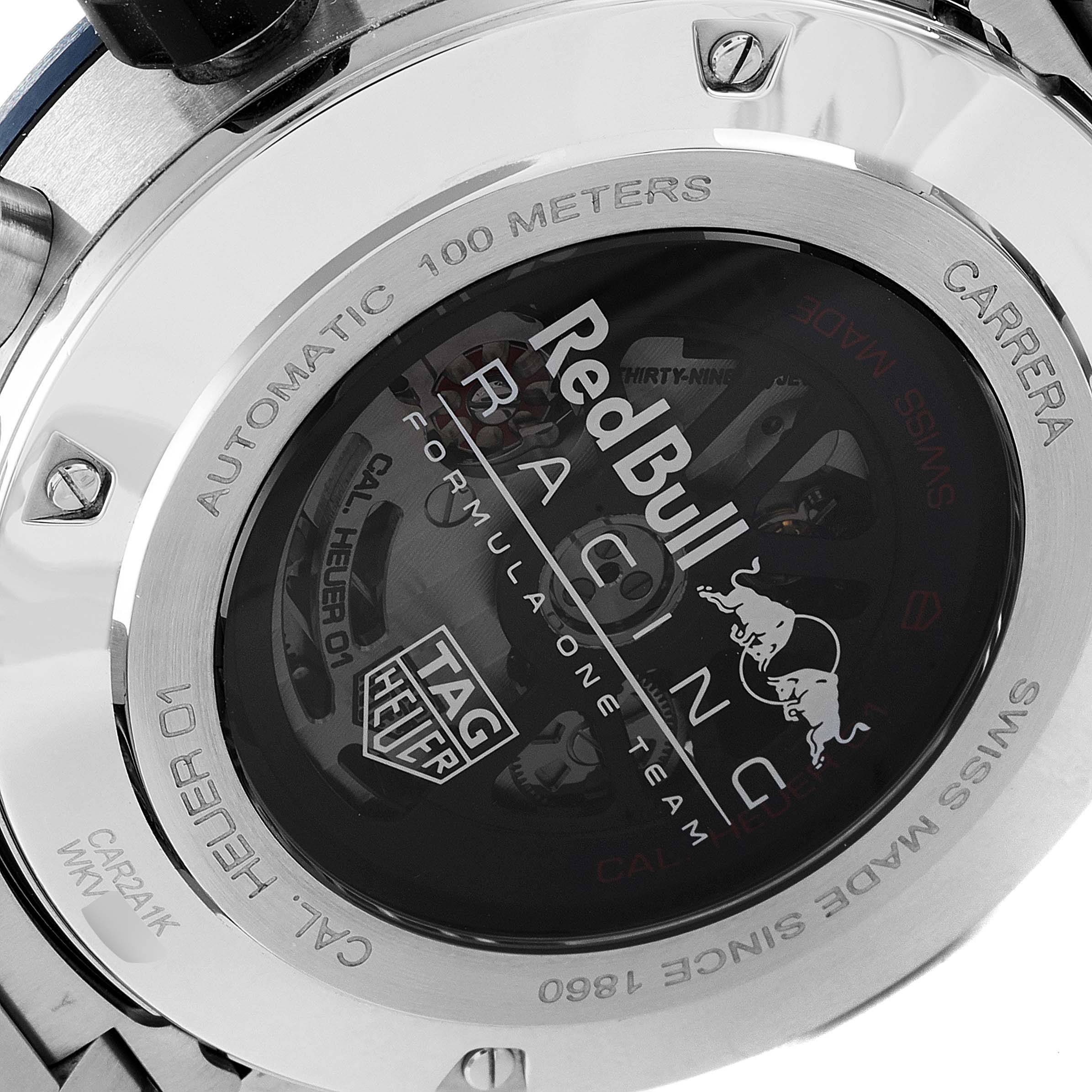 The image shows the back case of a Tag Heuer Carrera CAR2A1K.BA0703 Men's Stainless Steel Blue Dial CAR2A1K.BA0703 Men's Stainless Steel Blue Dial watch, highlighting the "Red Bull Racing" design and automatic mechanism.