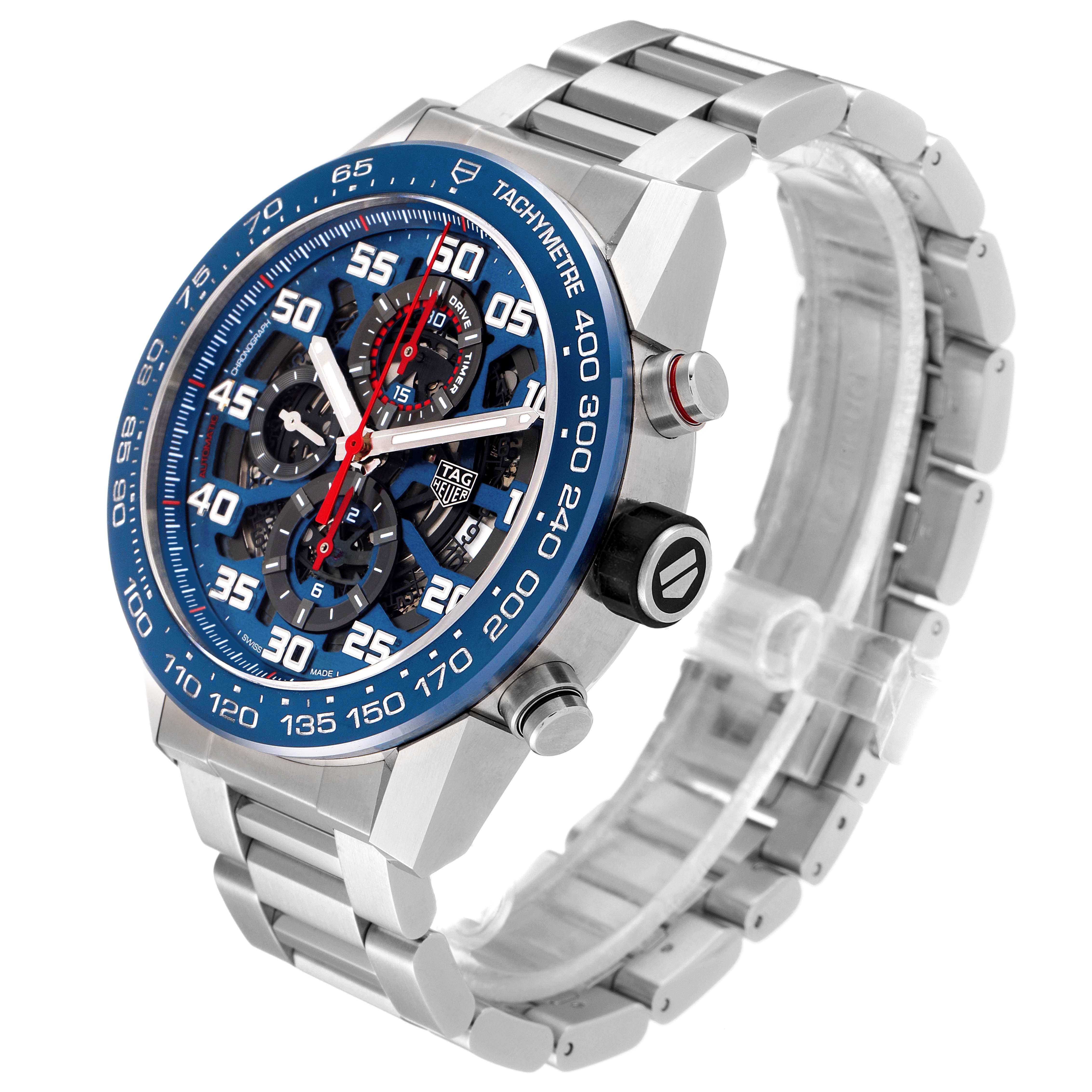 The Tag Heuer Carrera CAR2A1K.BA0703 Men's Stainless Steel Blue Dial CAR2A1K.BA0703 Men's Stainless Steel Blue Dial watch is shown from a front-side angle, highlighting its face, bezel, and metal bracelet.