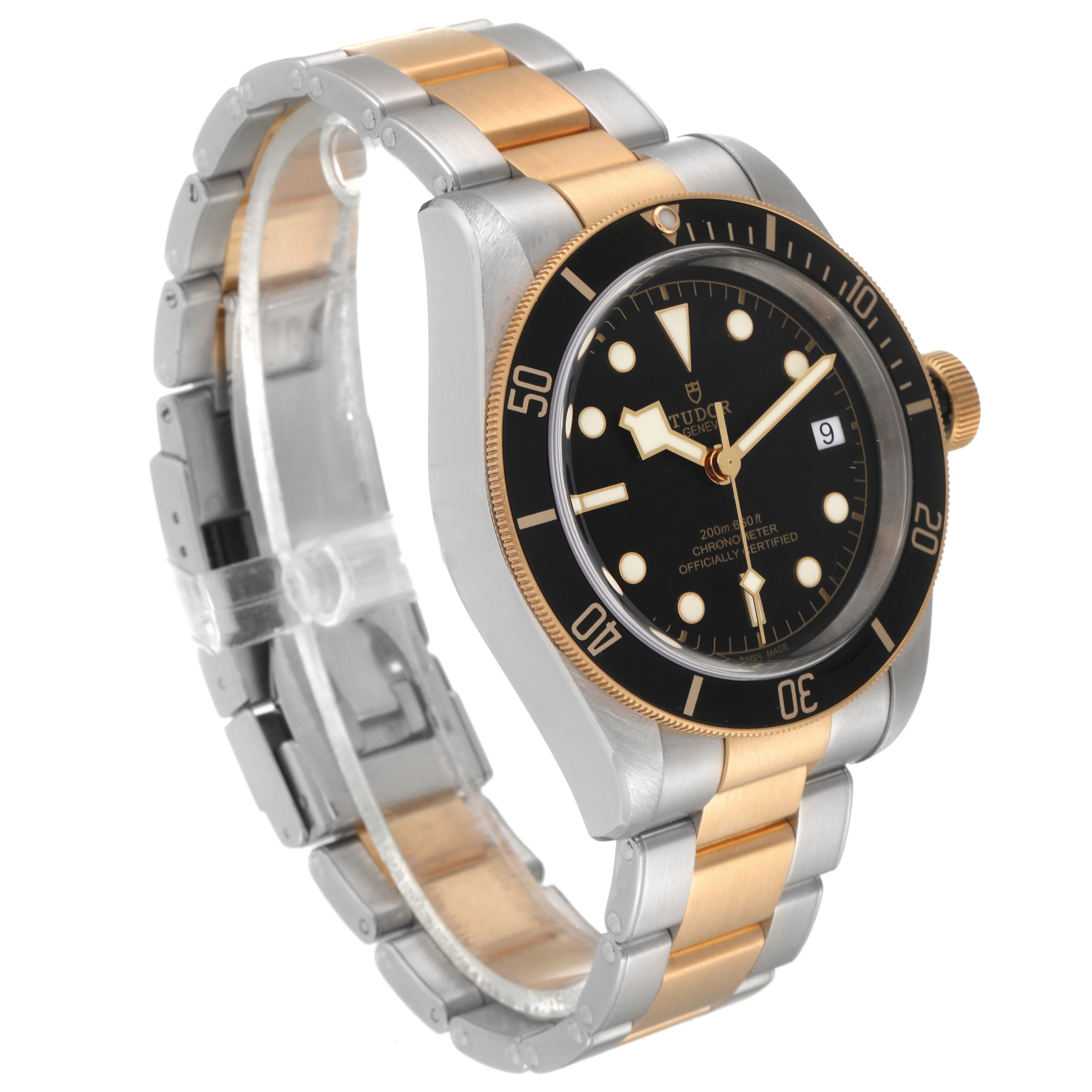 This image shows a side angle of the Tudor Heritage Black Bay 79733 Men's Steel and Gold (two tone) Black Dial 79733 Men's Steel and Gold (two tone) Black Dial watch, displaying the dial, bezel, crown, and two-tone bracelet.